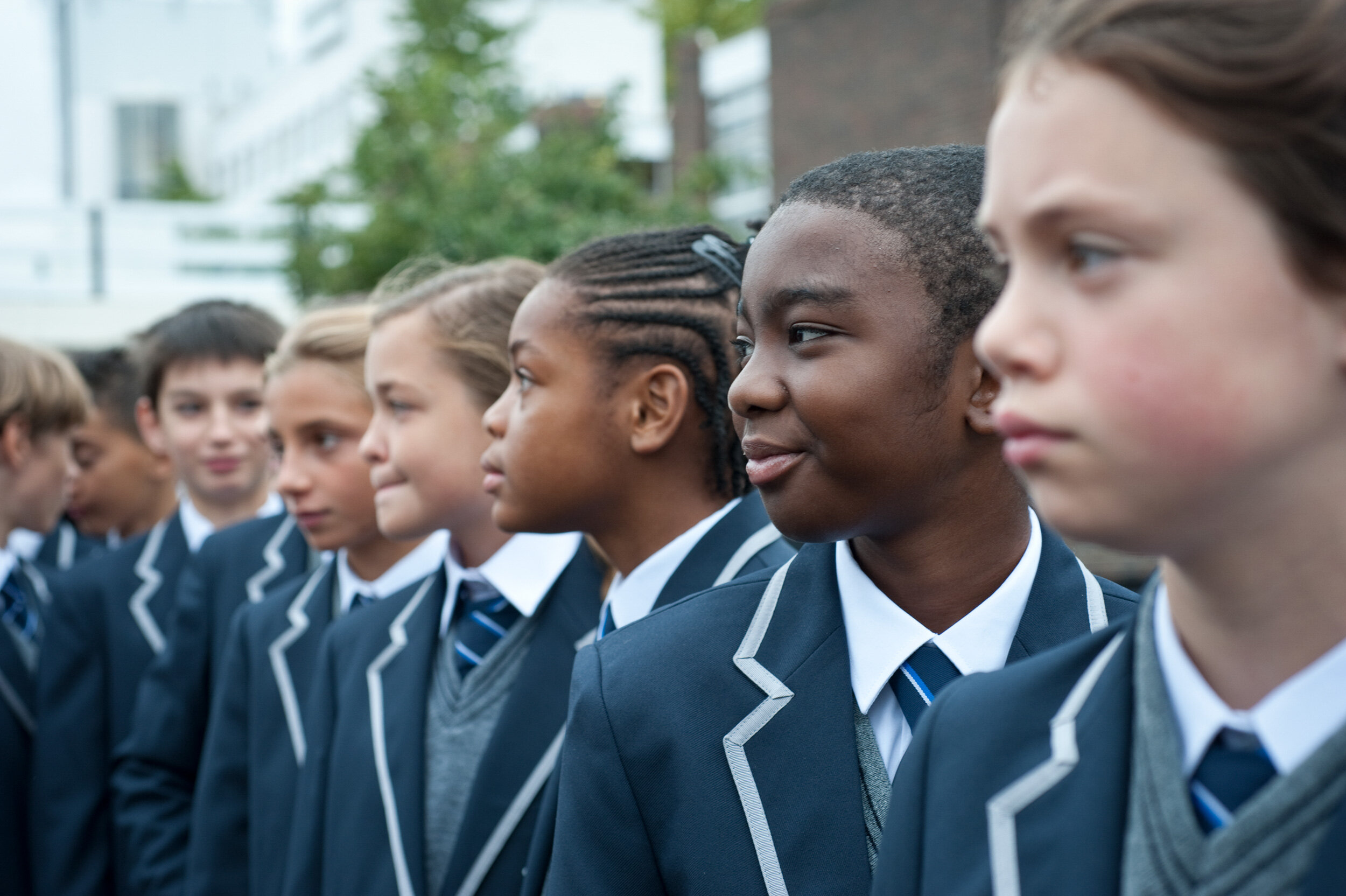  West London Free School, London W6, UK.  Lining up for school photo.  Shot by Eleanor Bentall, photographer. 
