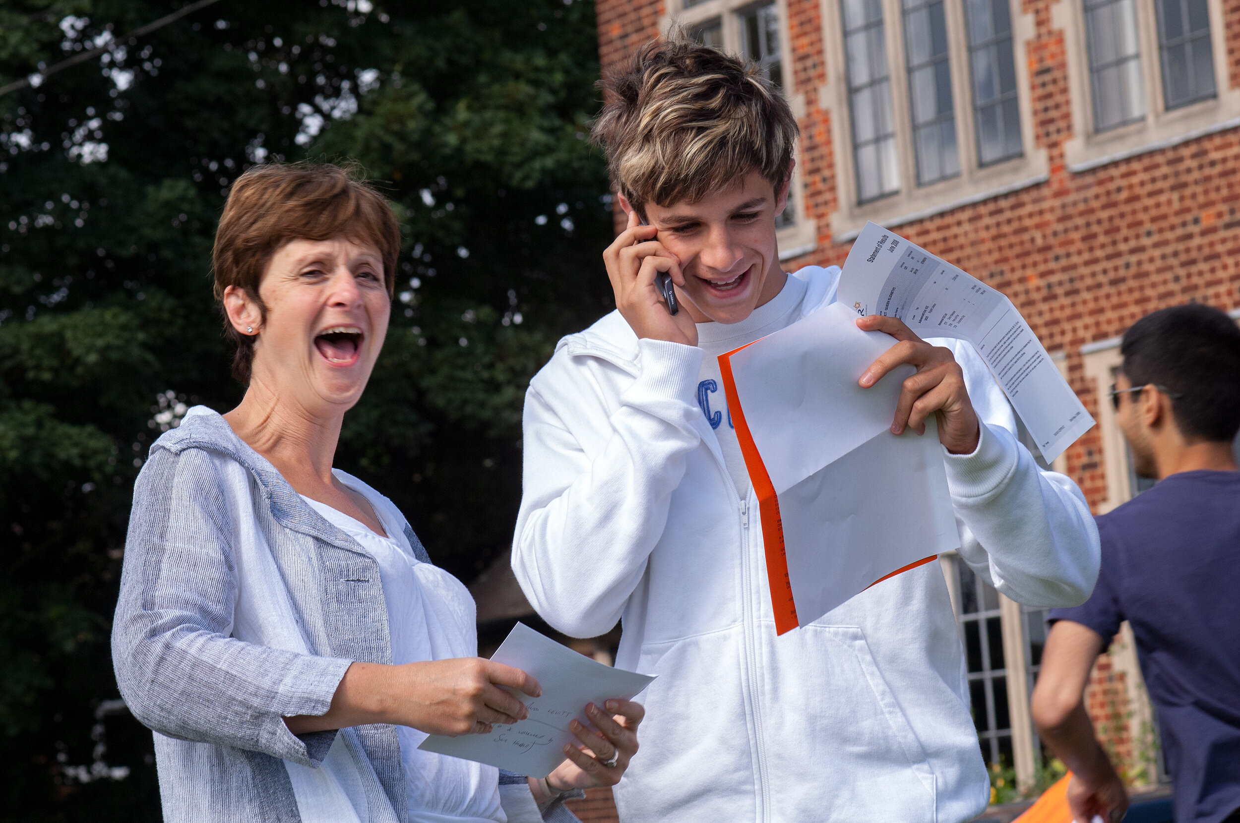  Queen Elizabeth’s School, Barnet, UK. A-level results day.  Mother and son.  Shot by Eleanor Bentall, photographer. 