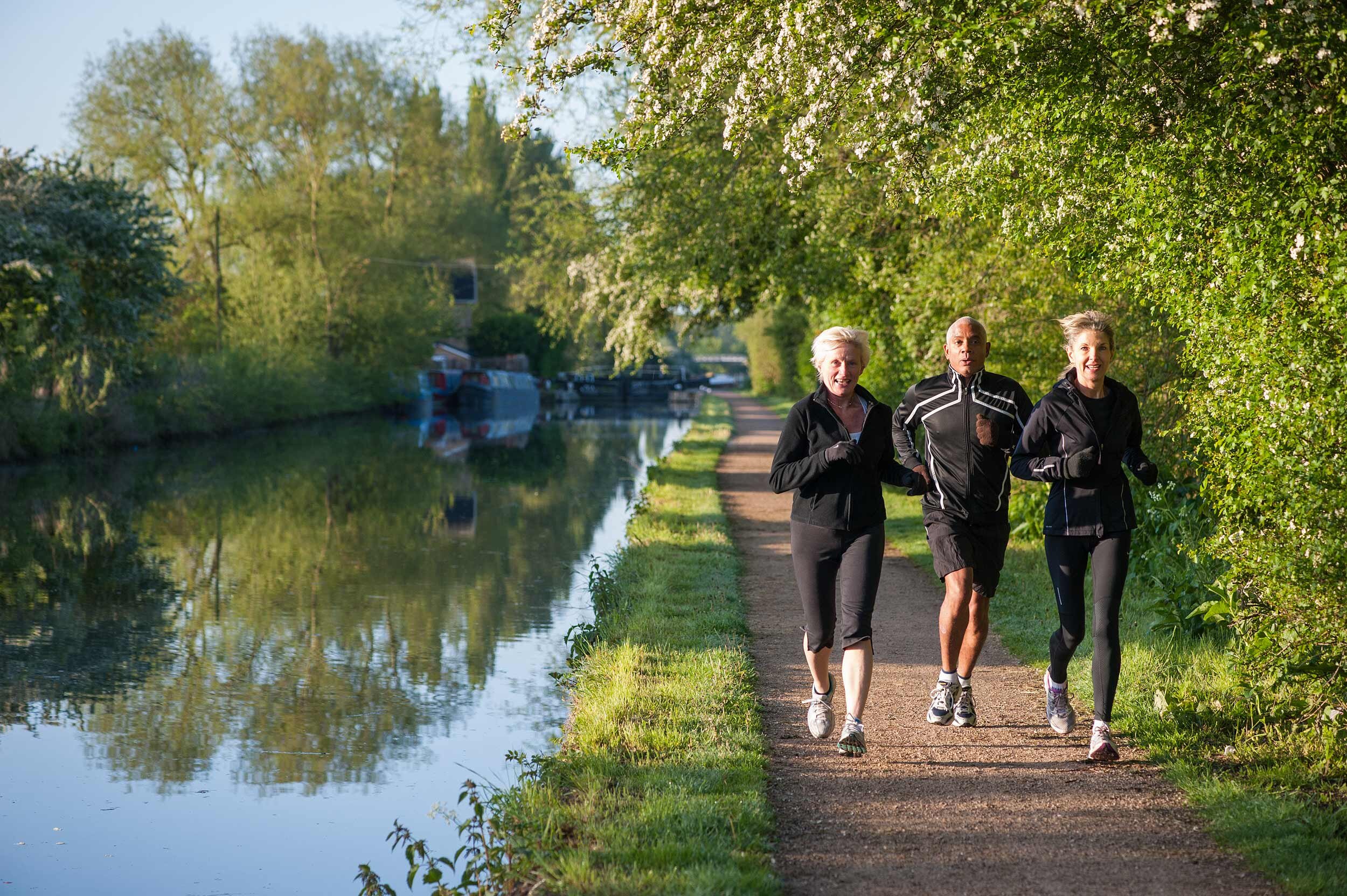  Lee Valley Park. River Lee Country Park.  Running on towpath near Cheshunt. Shot by Eleanor Bentall, photographer.  