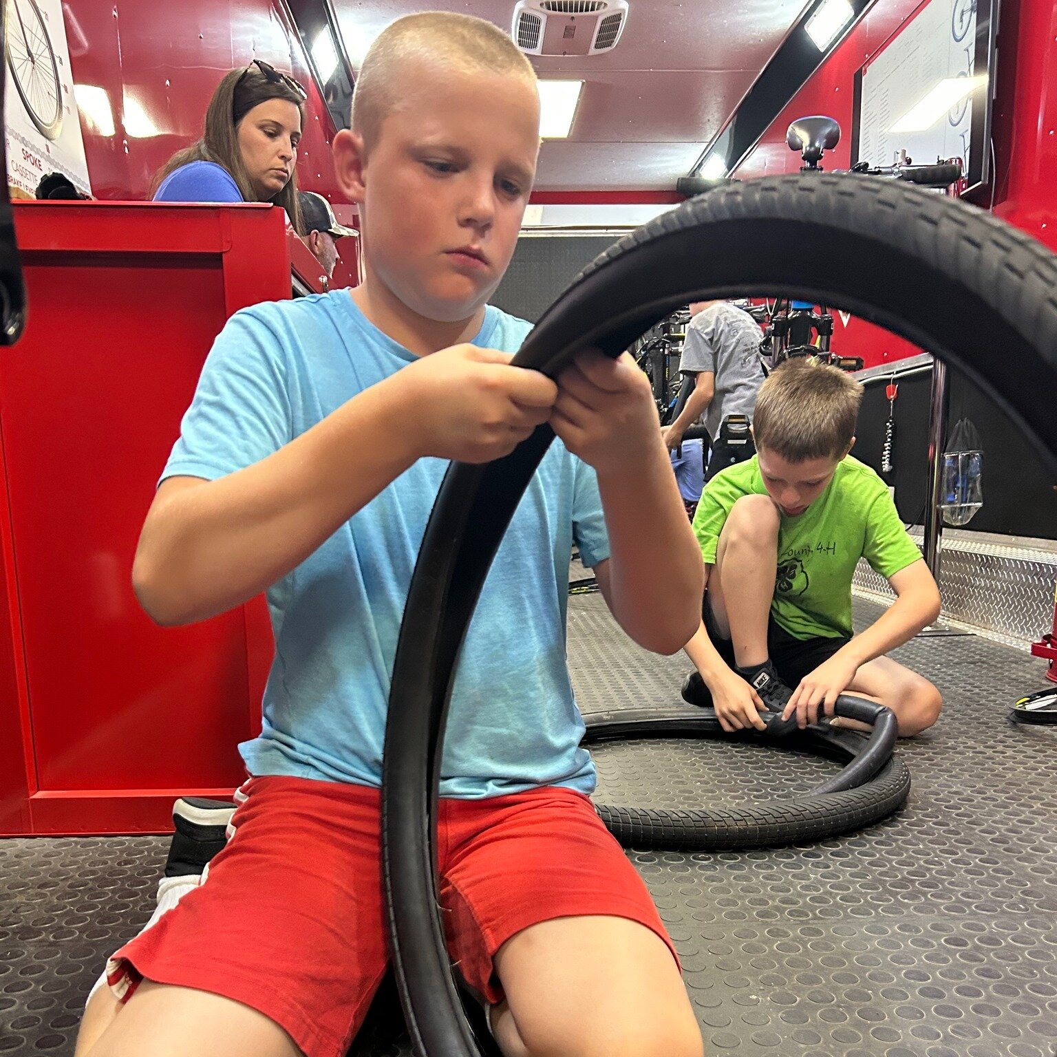 We&rsquo;re not two-tired to learn more about bikes! #KidsBuildingBikesCamp with @nine13sports continued today focusing on all things tires. Students learned how a bike tire is made, how to remove a rear wheel, and how to check for air leaks and corr