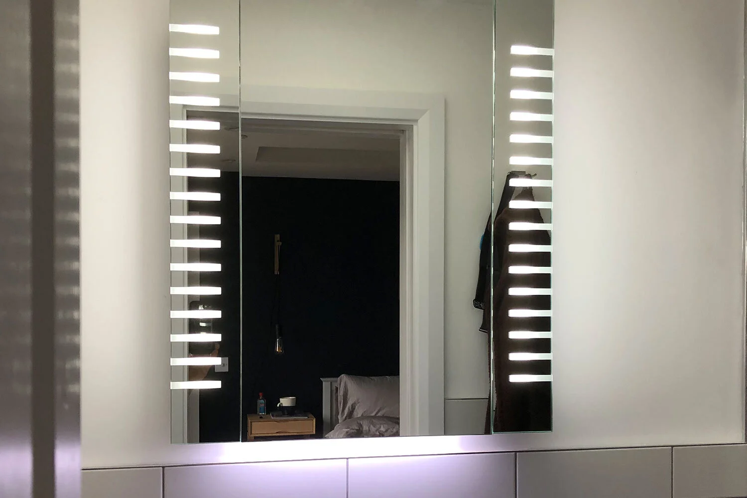 Bathroom mirror lighting installation