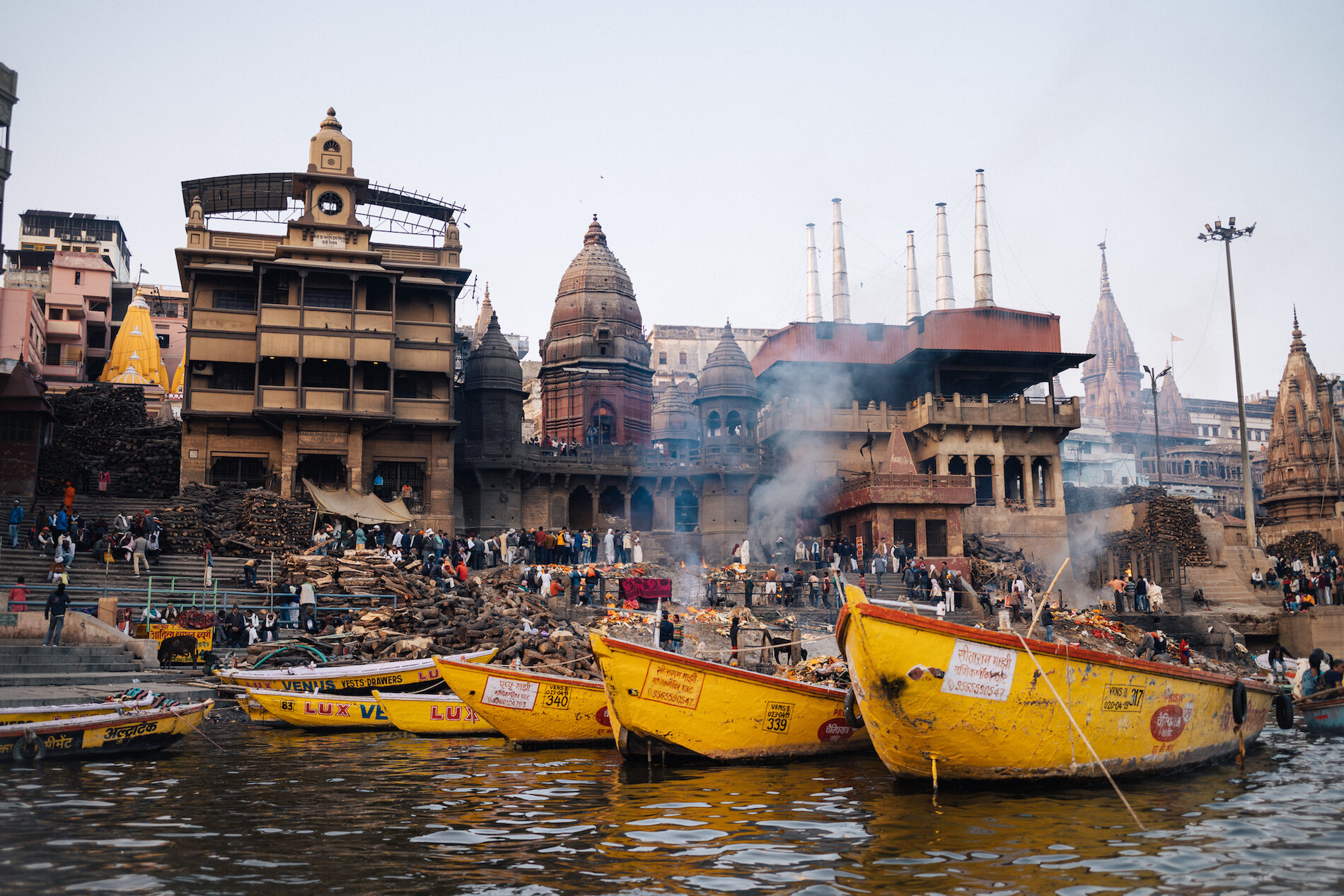  The Manikarnika Ghat - one of two places where cremations take place - as seen from a boat on the Ganges. 