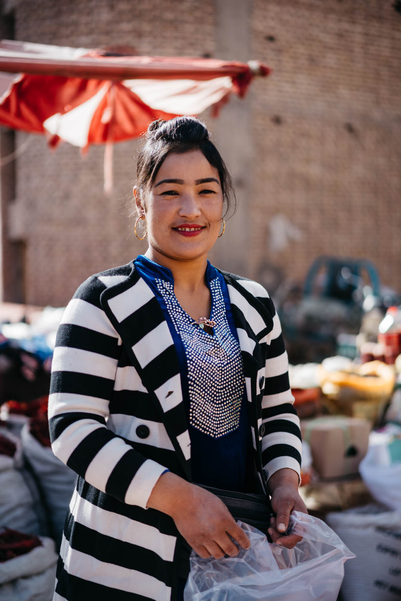  A Uyghur shopkeeper at the bazaar 