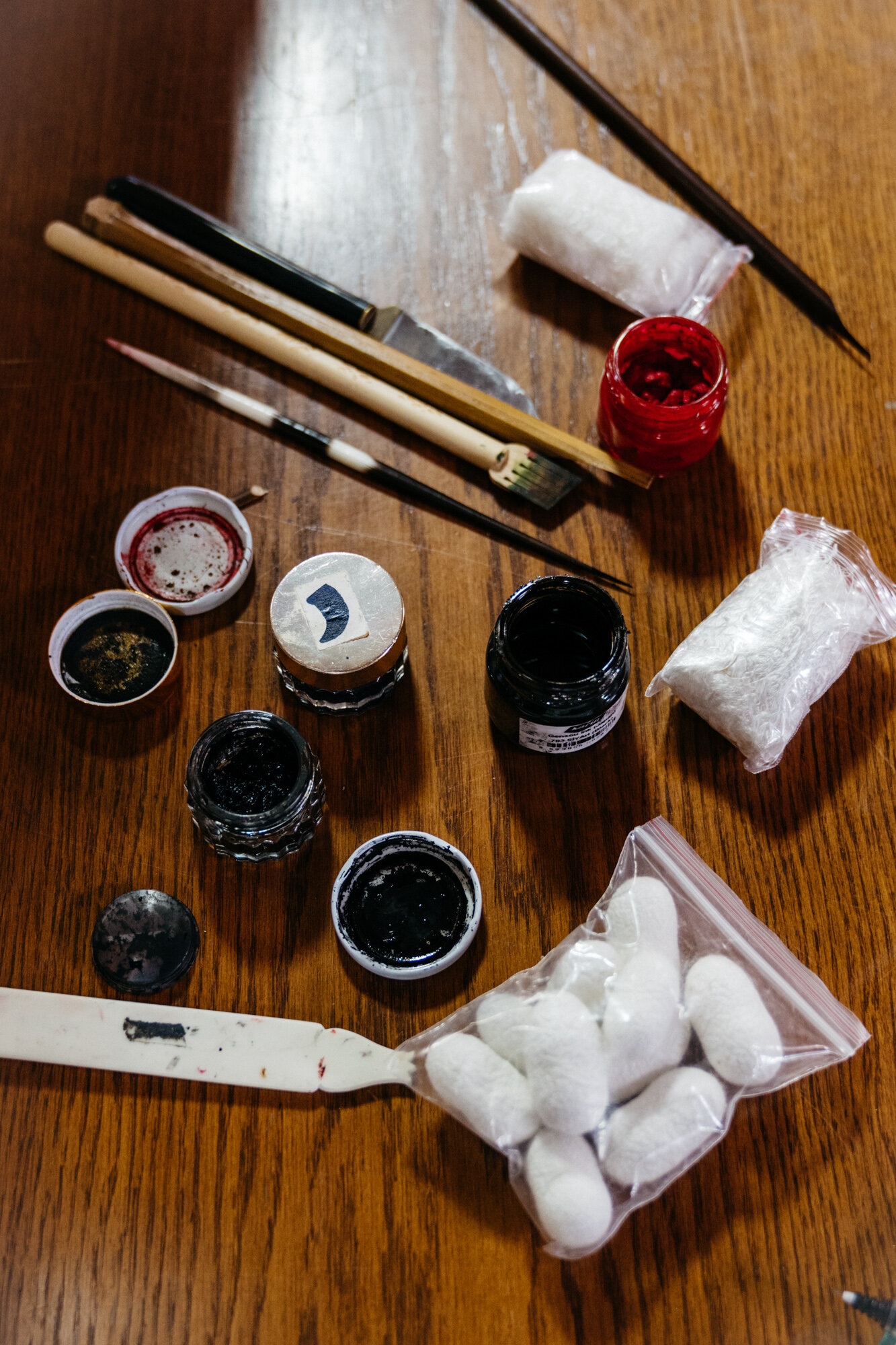  Some of Ayten's calligraphy materials. She puts silk in her ink pots to keep the ink fresh. 