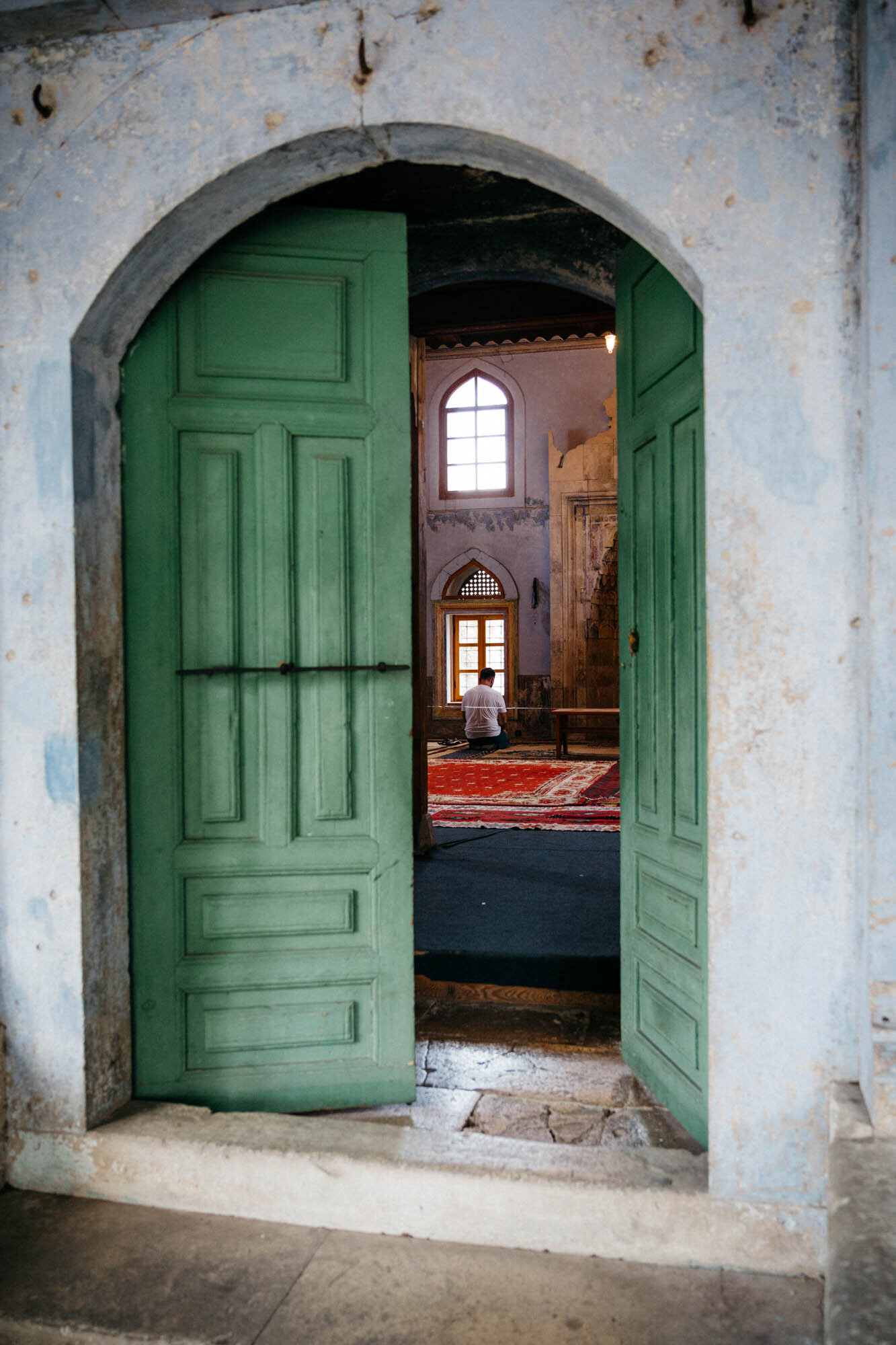 A man at prayer inside the Hadži Kurt Mosque 