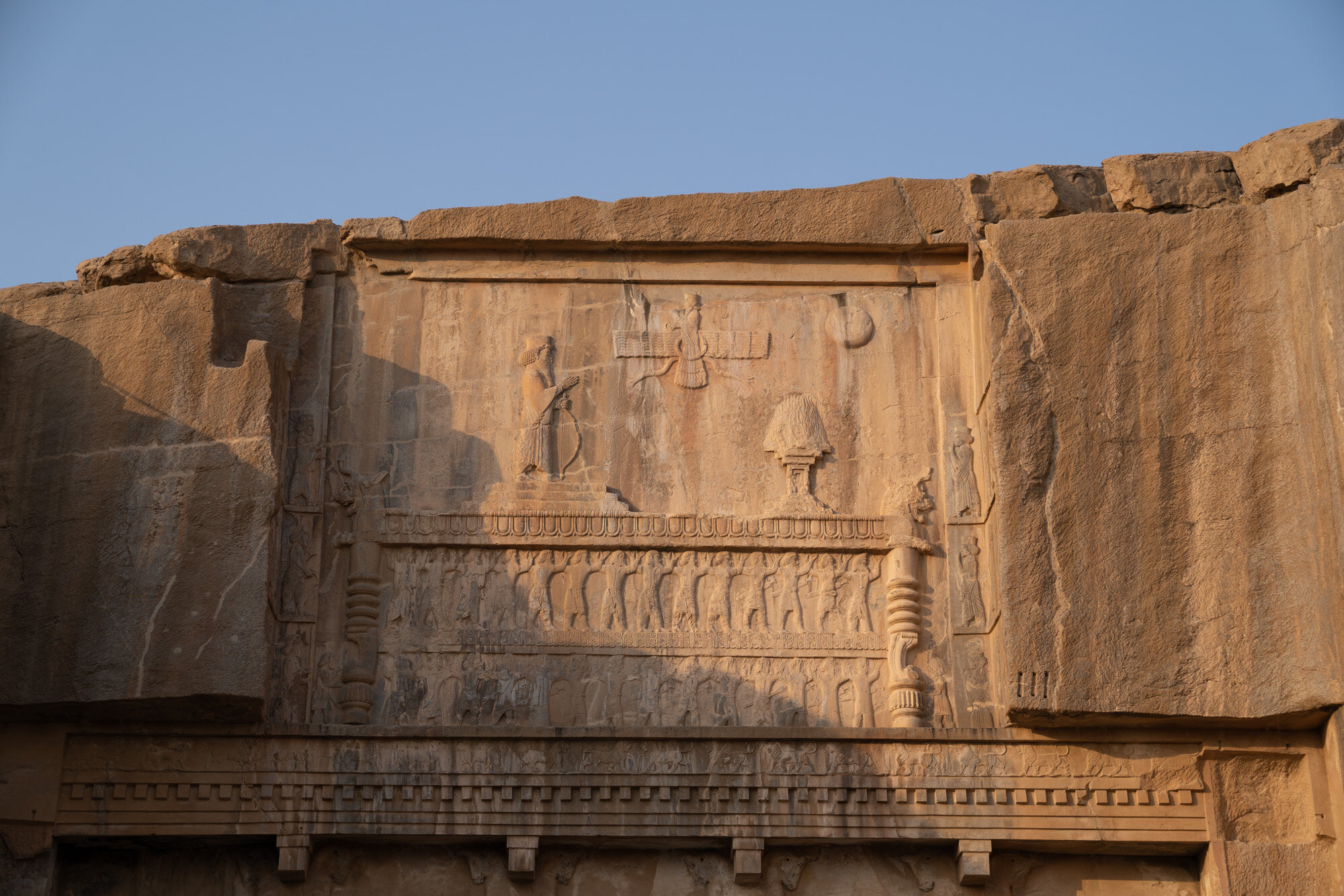  The symbol of Zoroastrianism - the Faravahar  -  carved into one of the tombs at Persepolis 