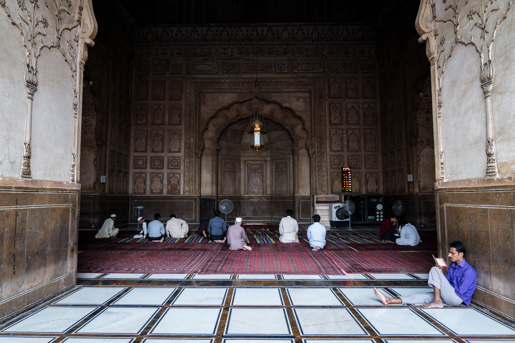 Praying and reading before the Mihrab 