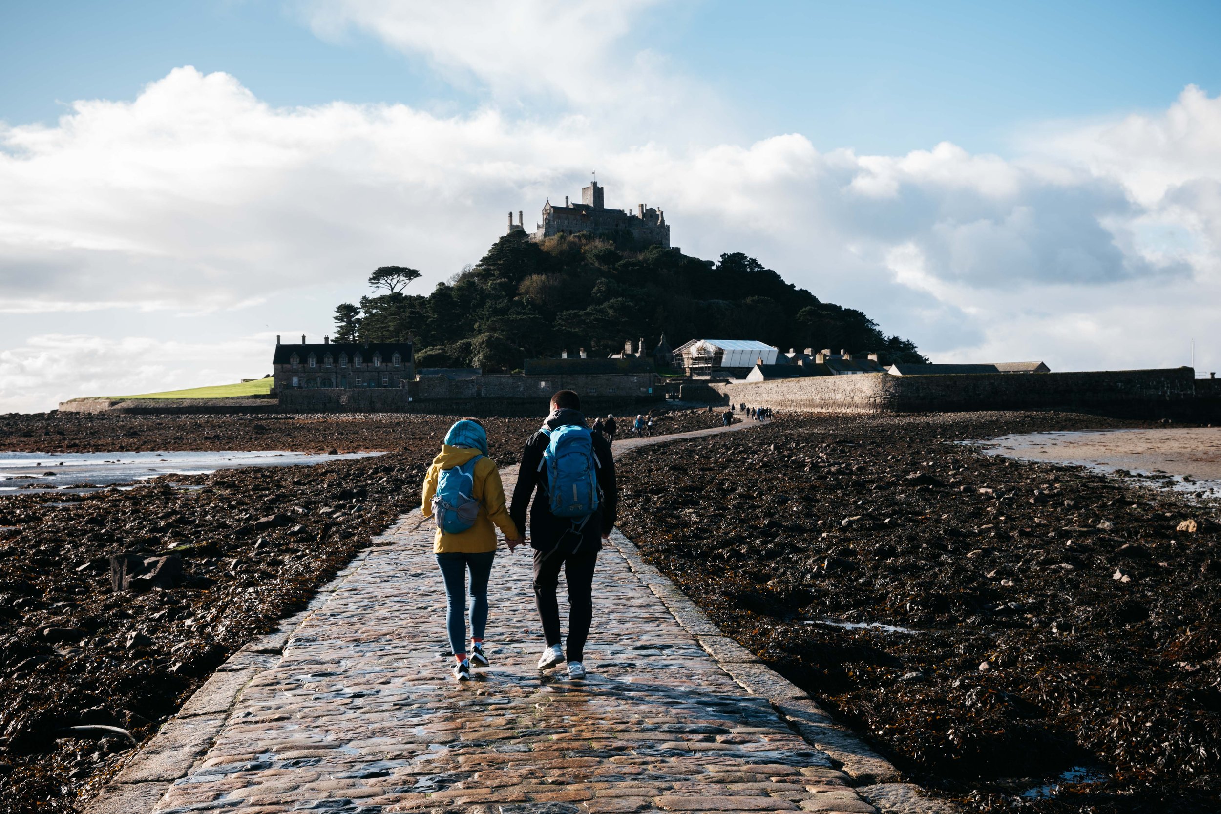  The walkway which is submerged when the tide comes in 