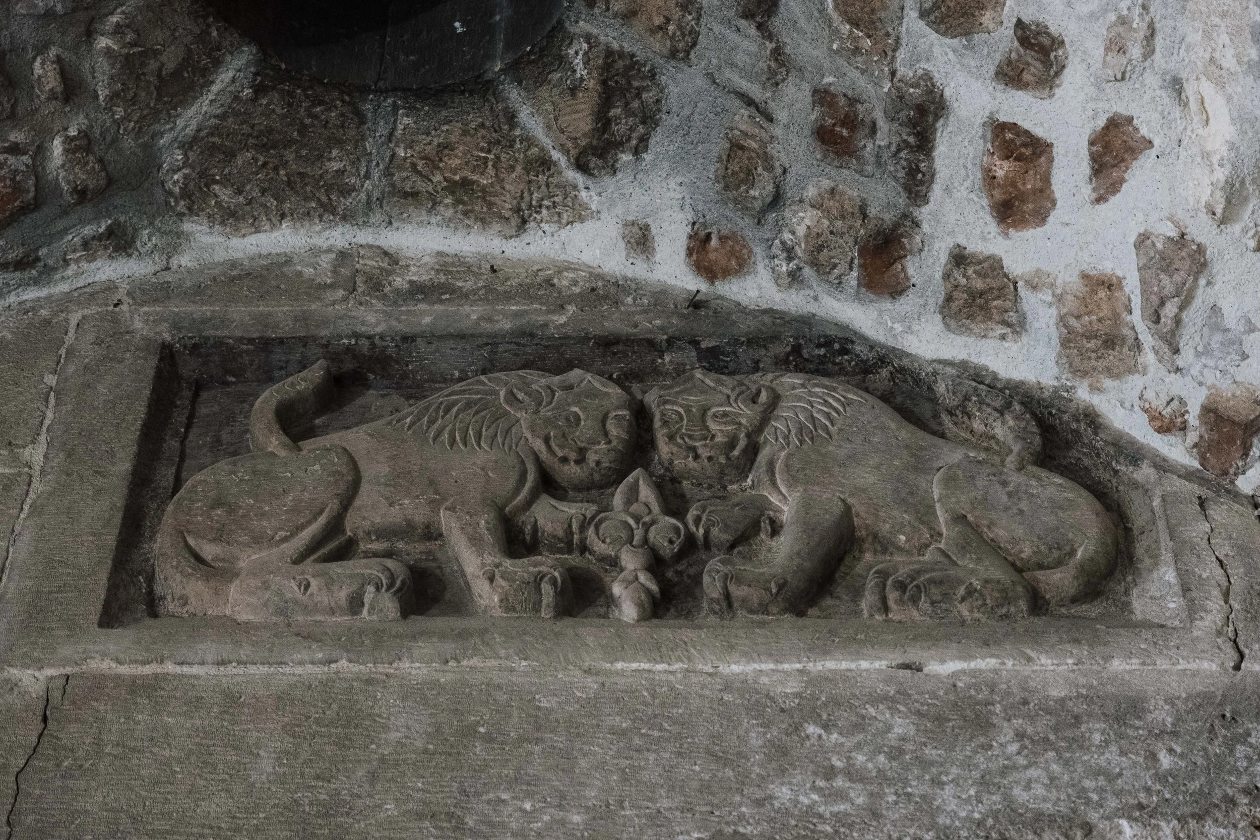  The symbol of the Ayyubid dynasty - two lions and lily flower - is visible above the iron door that leads up to the interior of the Citadel. 