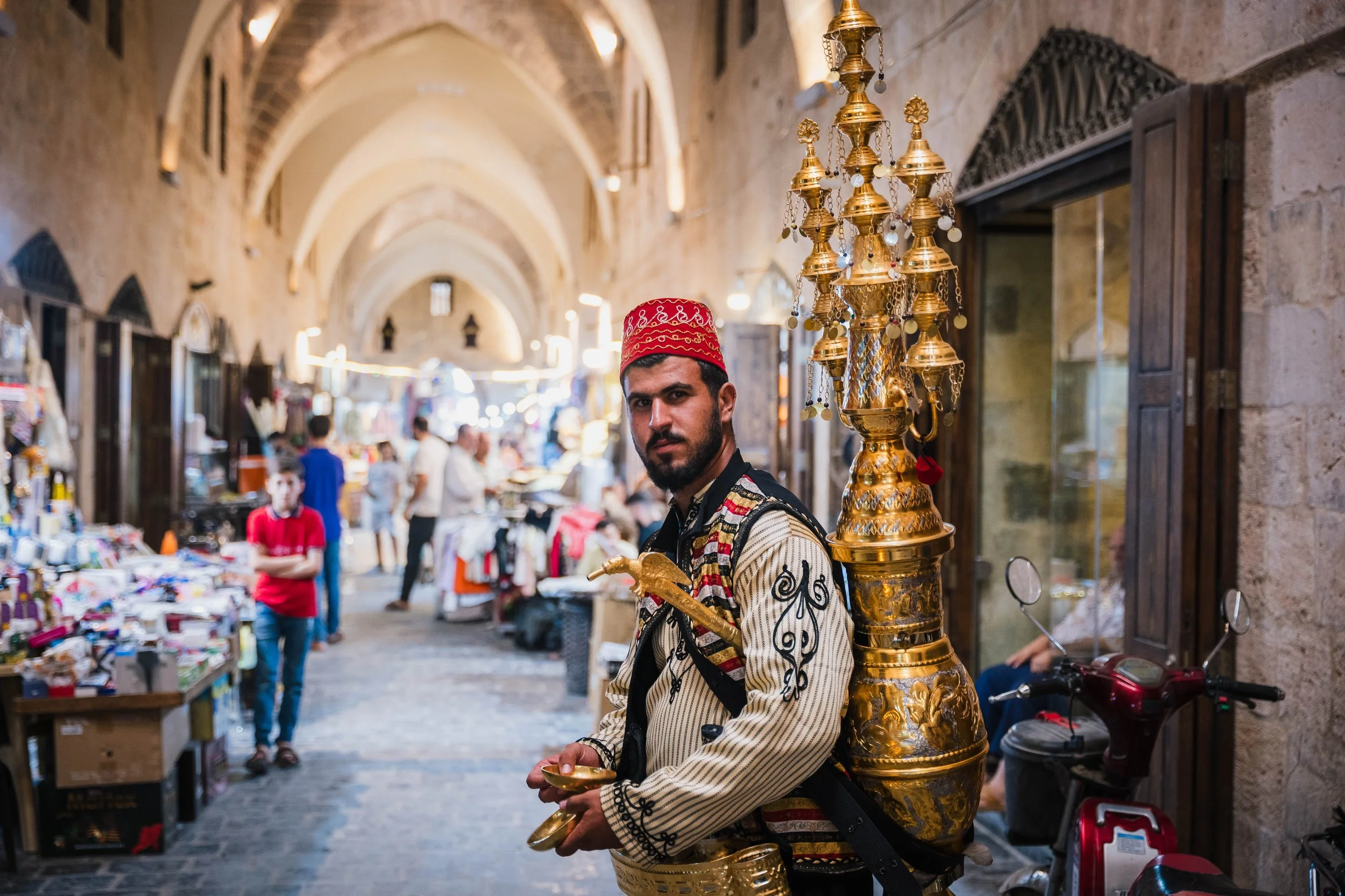  An erk sous (liquorice drink) seller in a restored section of the souk 