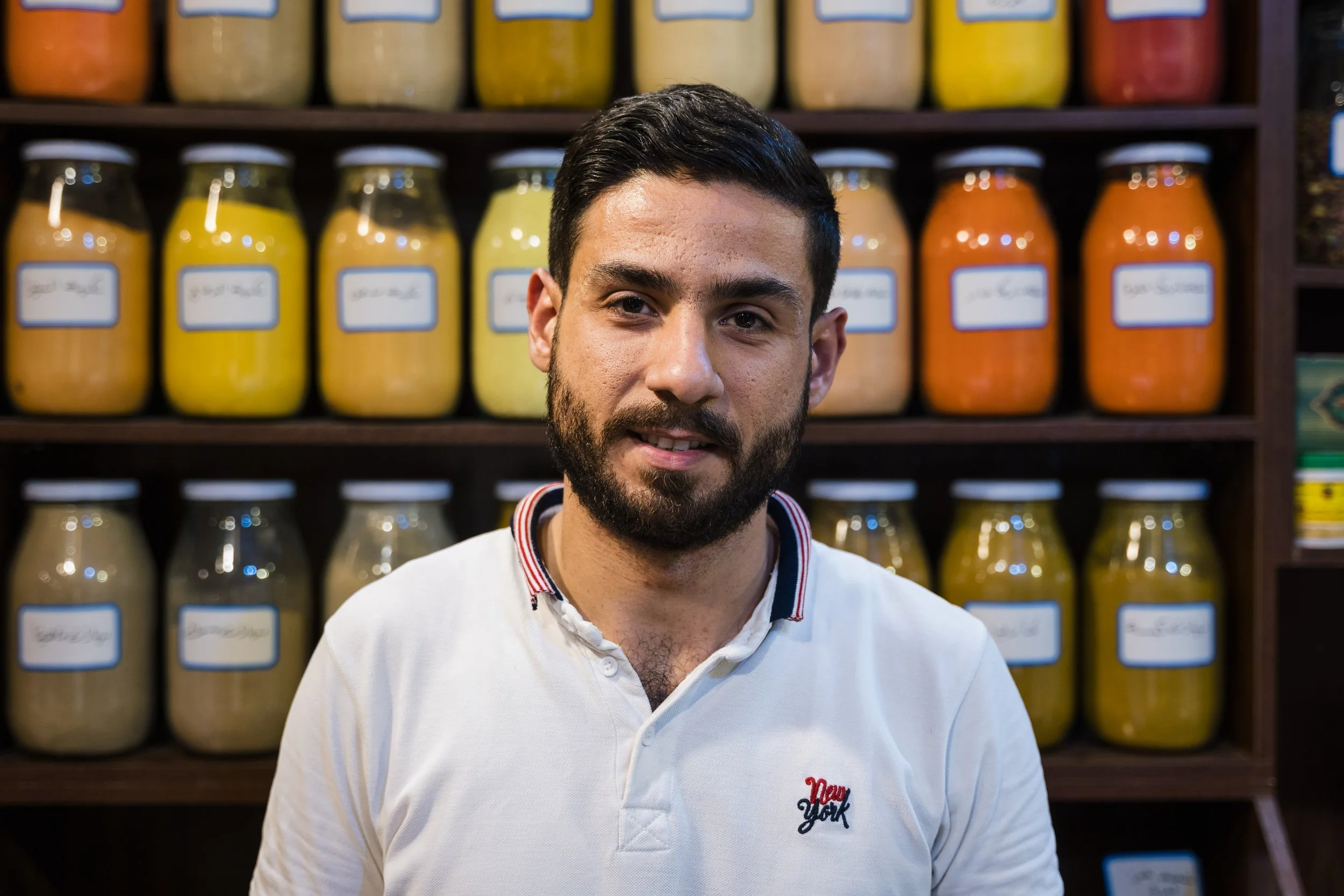  Ammad Qaynouz, an engineer that sometimes works in his father’s spice shop.&nbsp;The shop was restored as part of the Aga Khan Trust for Culture’s restoration work in 2023.&nbsp;“I like the new version of the souk,” he says. “It is better than befor