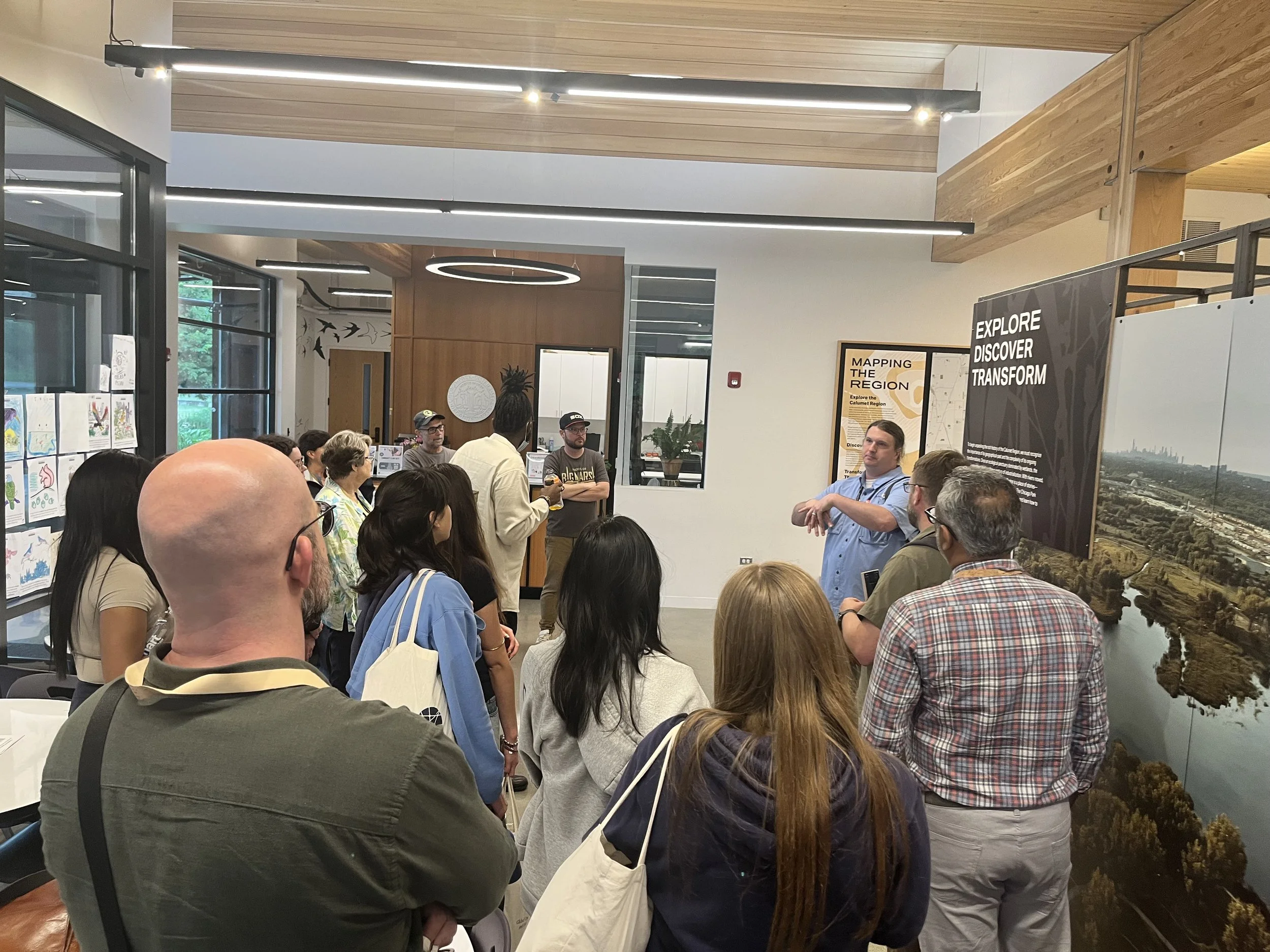 Adam Ferguson of the Field Museum share insights with SRI Congress excursion participants in June 2025 at the Ford Calumet Environmental Center.