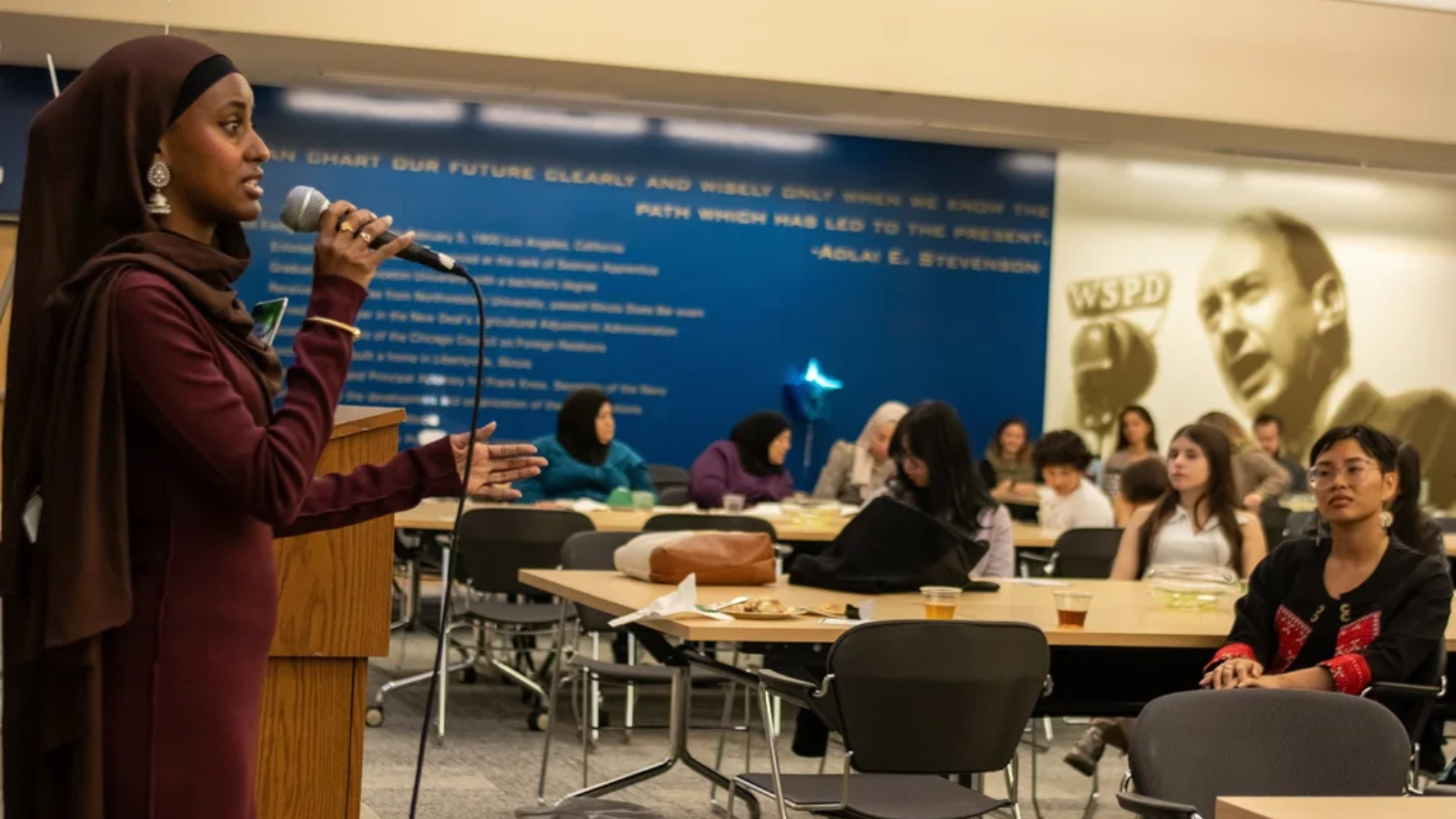 Zaynab Abdi presenting her experience with Green Card Youth Voices to Chicago-area students.