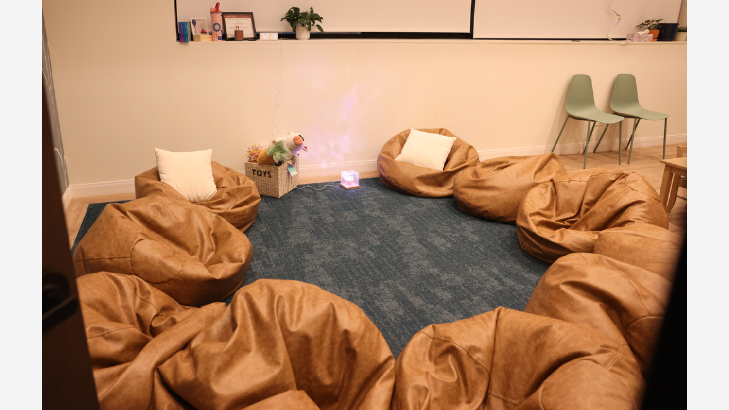 A pediatric group support room within Upward Community’s building