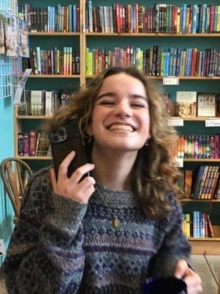 A photo of Makena in the bookstore.