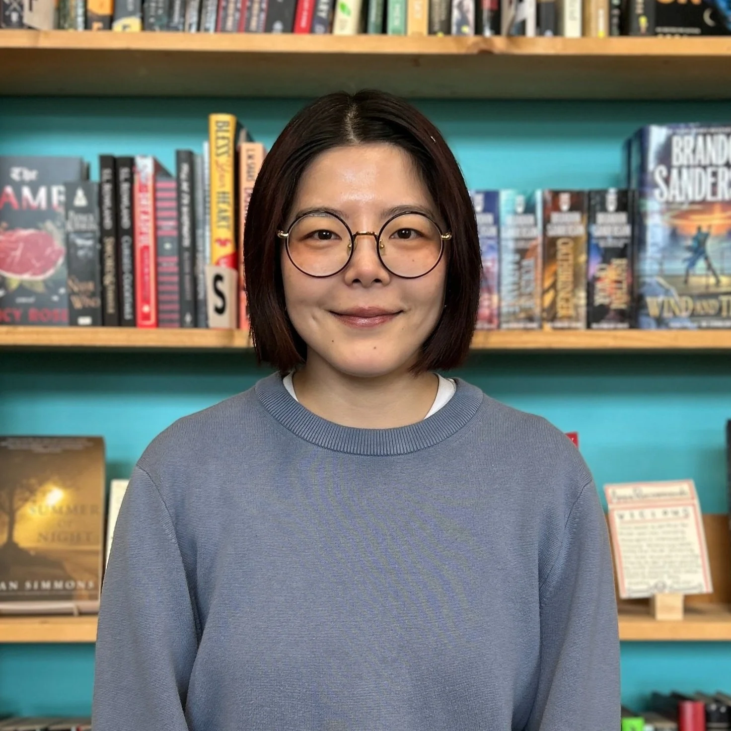 A photo of Emily in the bookstore.