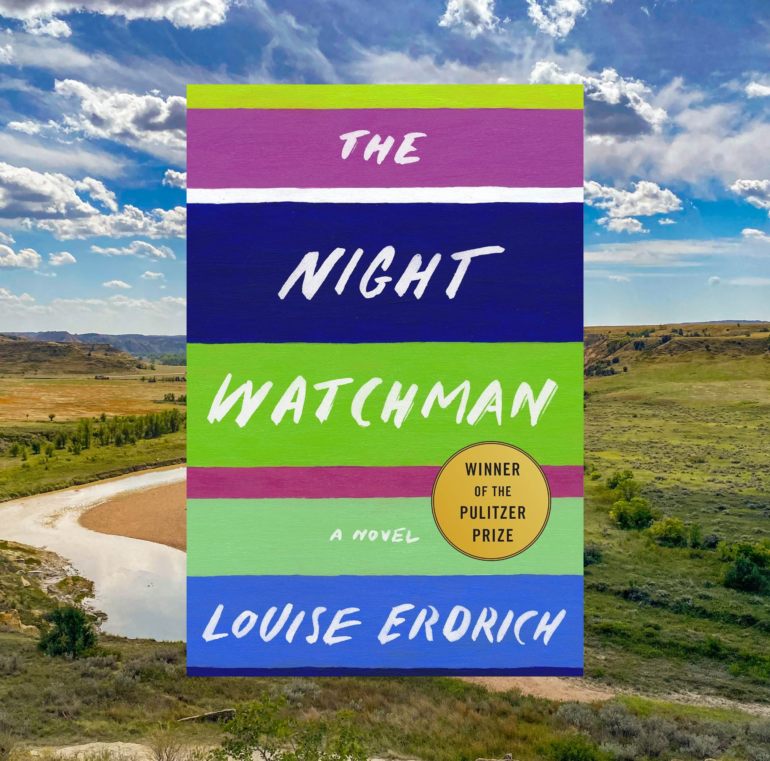 The cover of The Night Watchman by Louise Erdrich on a background of a photo of a river.