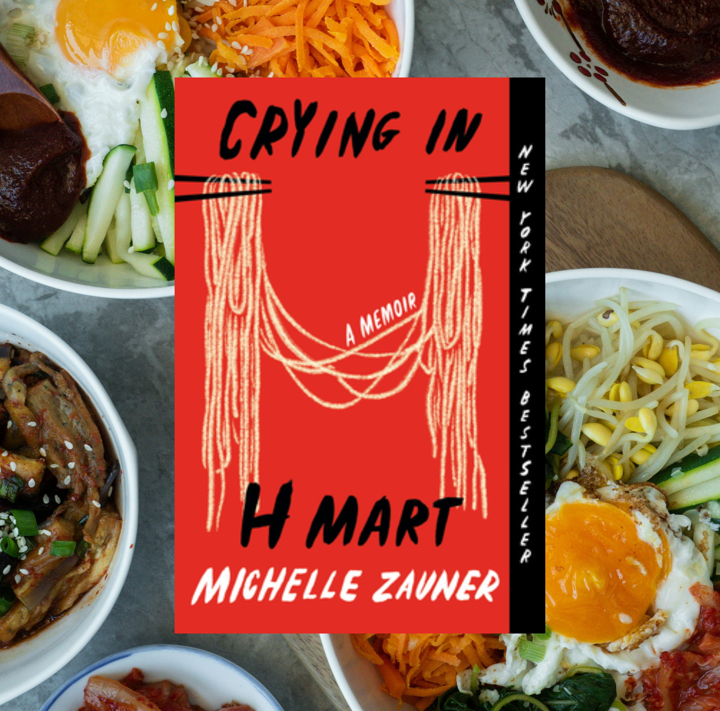The cover of Crying in H Mart by Michelle Zauner on a background of a photo of multiple asian food dishes.