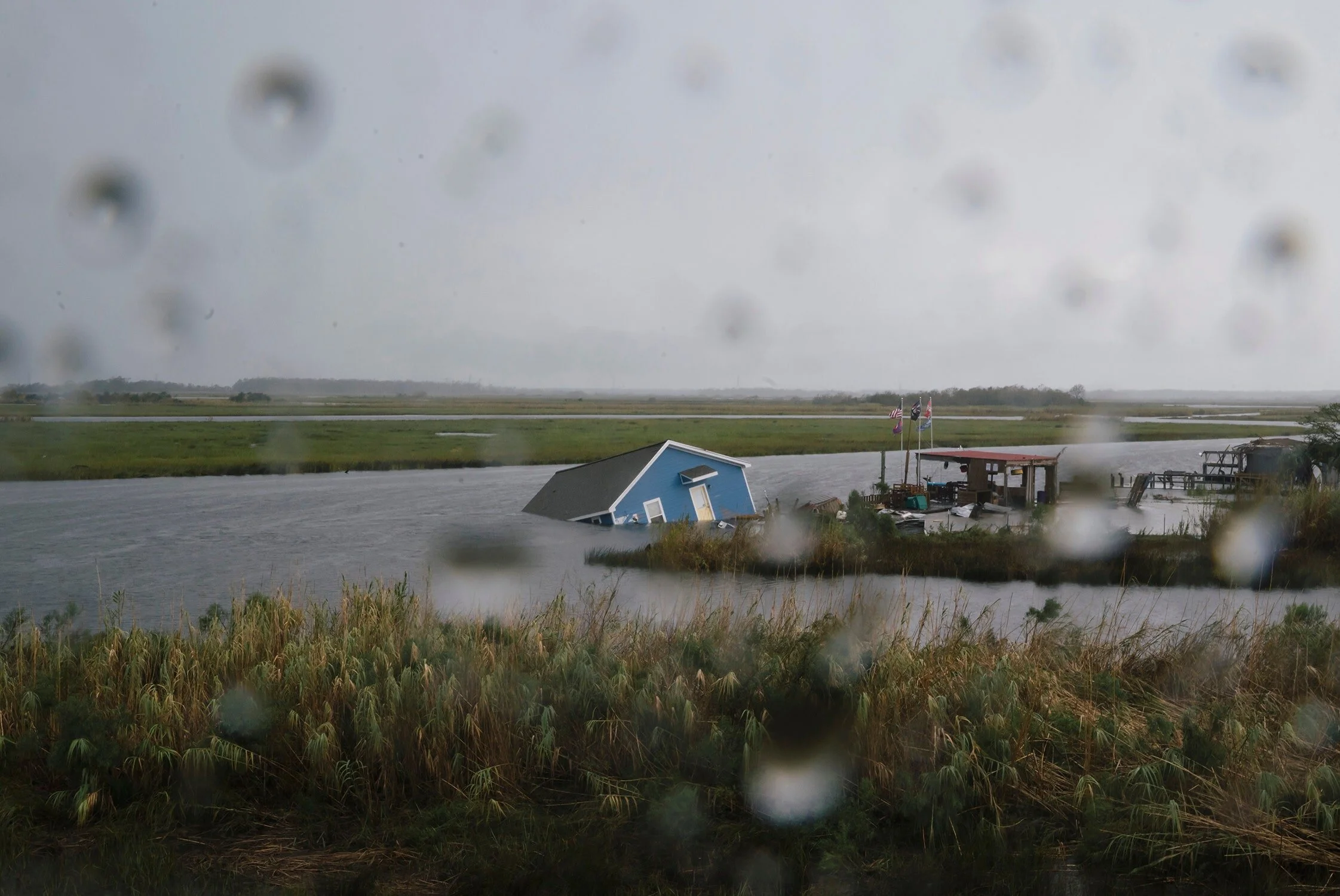 The extra energy trapped by the atmosphere is expressing itself every second of every hour, usually quietly; you may not notice it, but eventually a downpour turns into a flood.Photograph by Eric Thayer / Getty