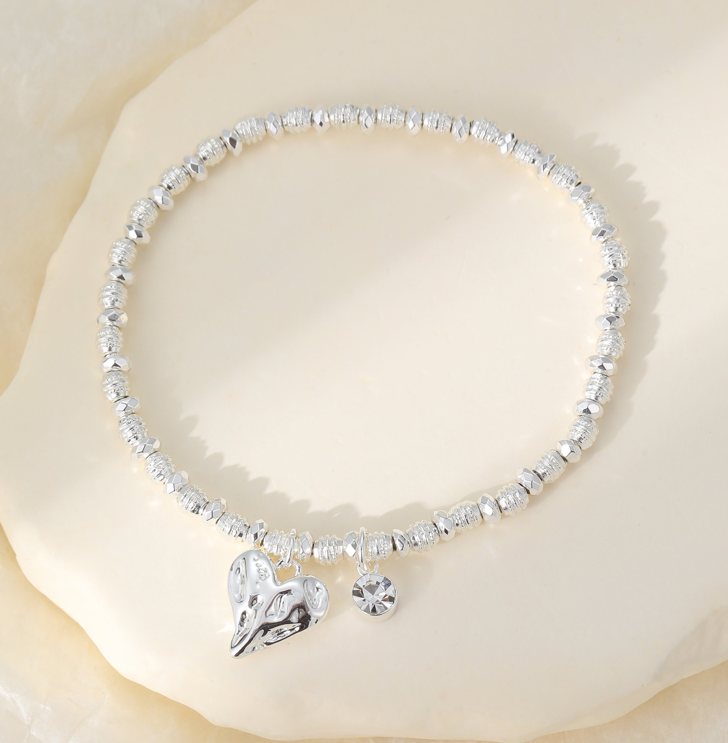 B302338S.  Heart charm bracelet