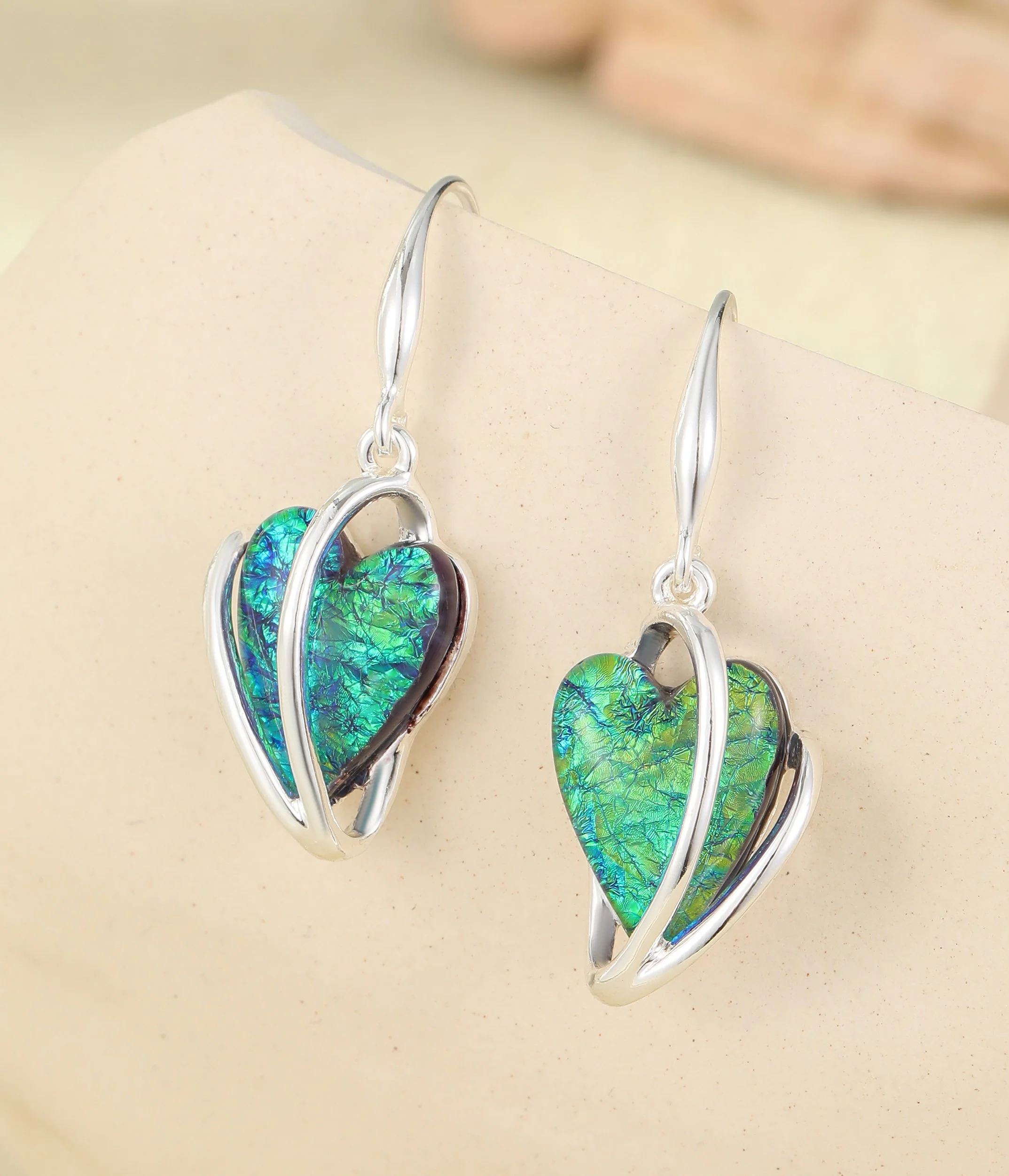 E102398S.  Green acrylic heart drop earrings