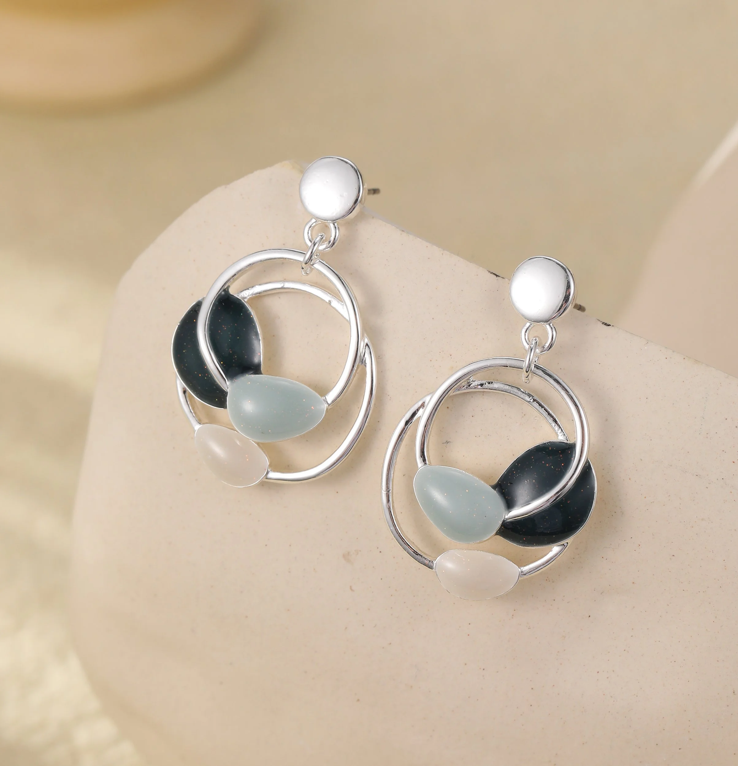 E102500S.  Stud drop earrings