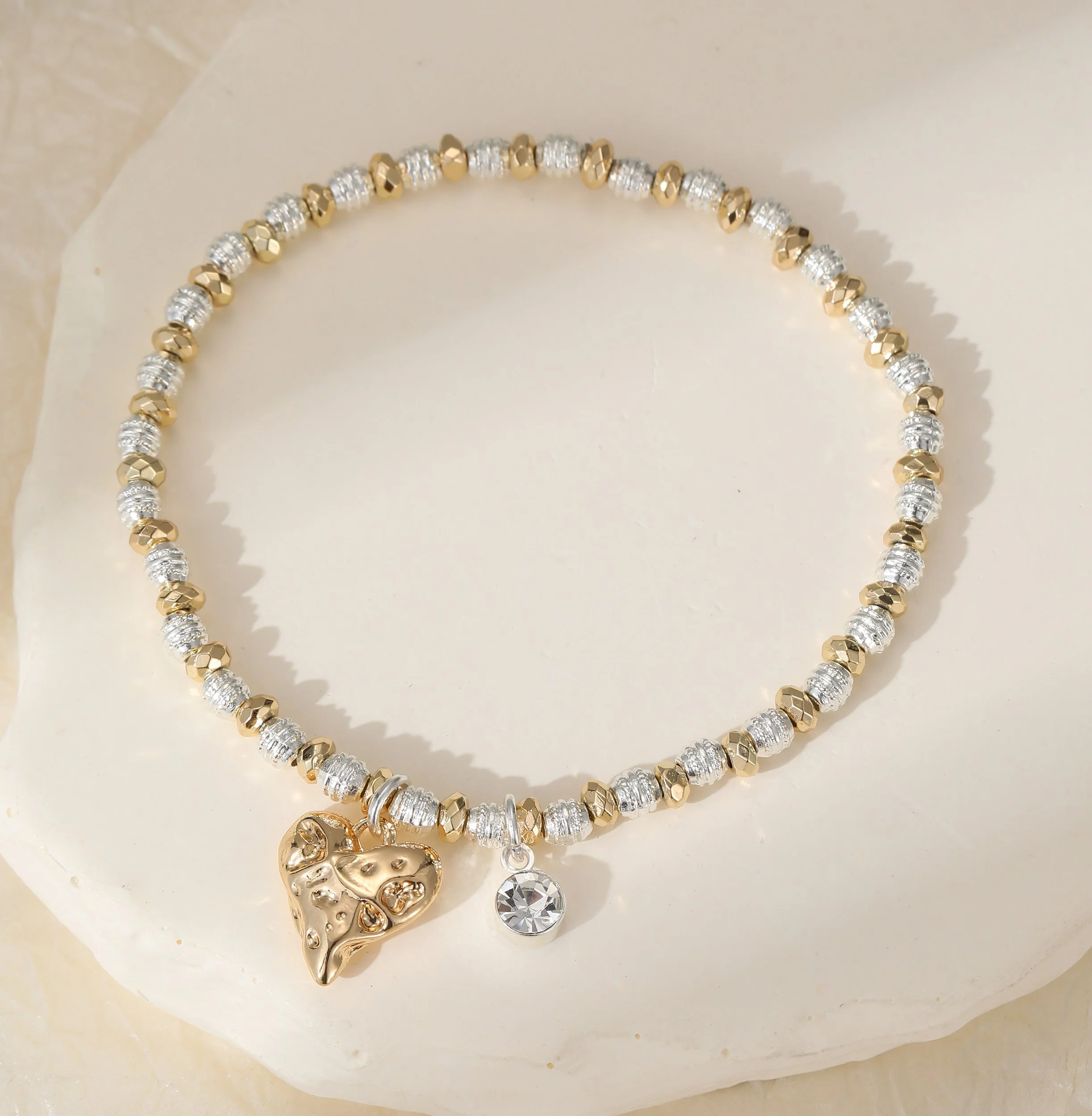 B302338G.  Heart charm bracelet