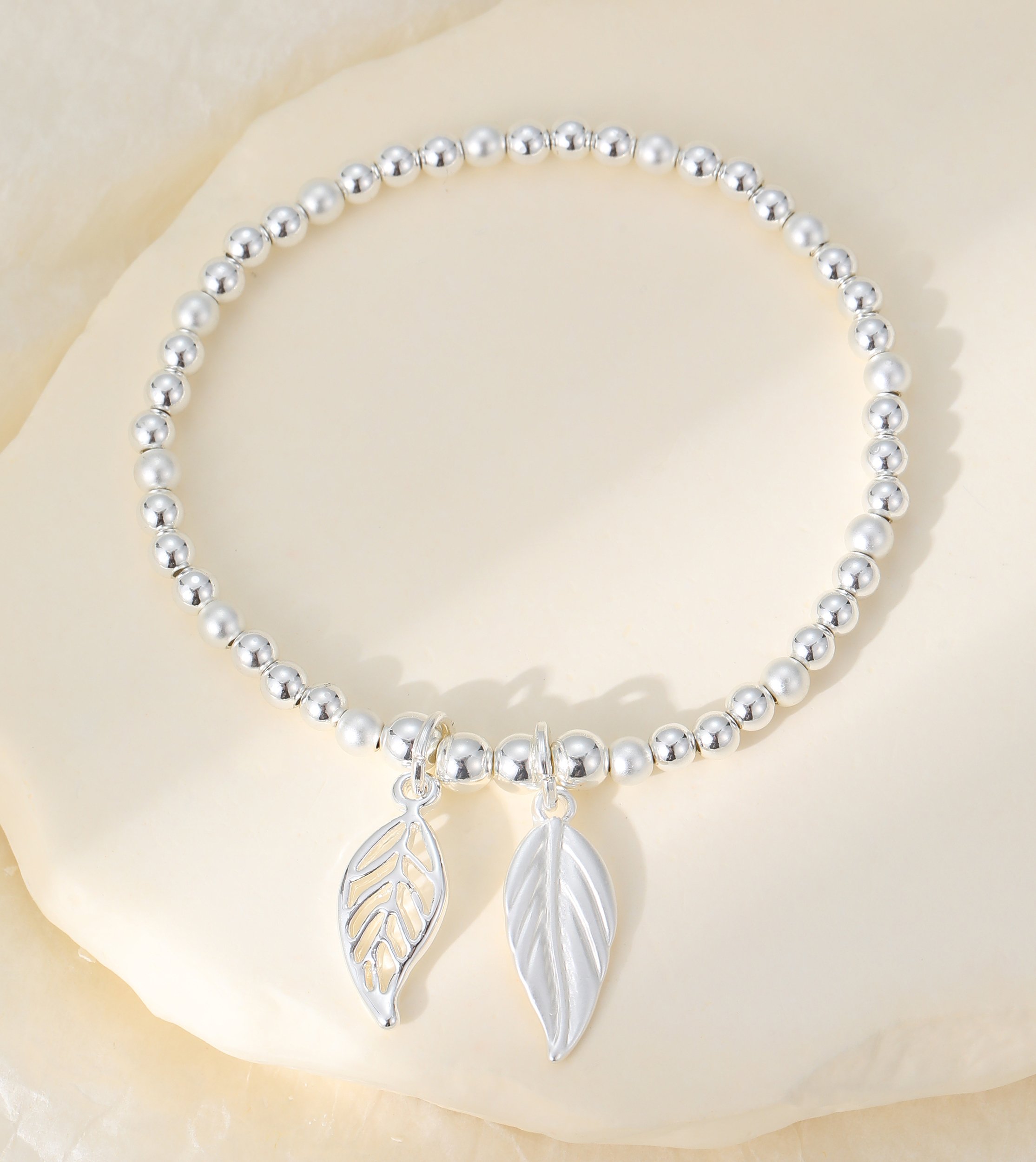 B302321S.  Leaves charm bracelet