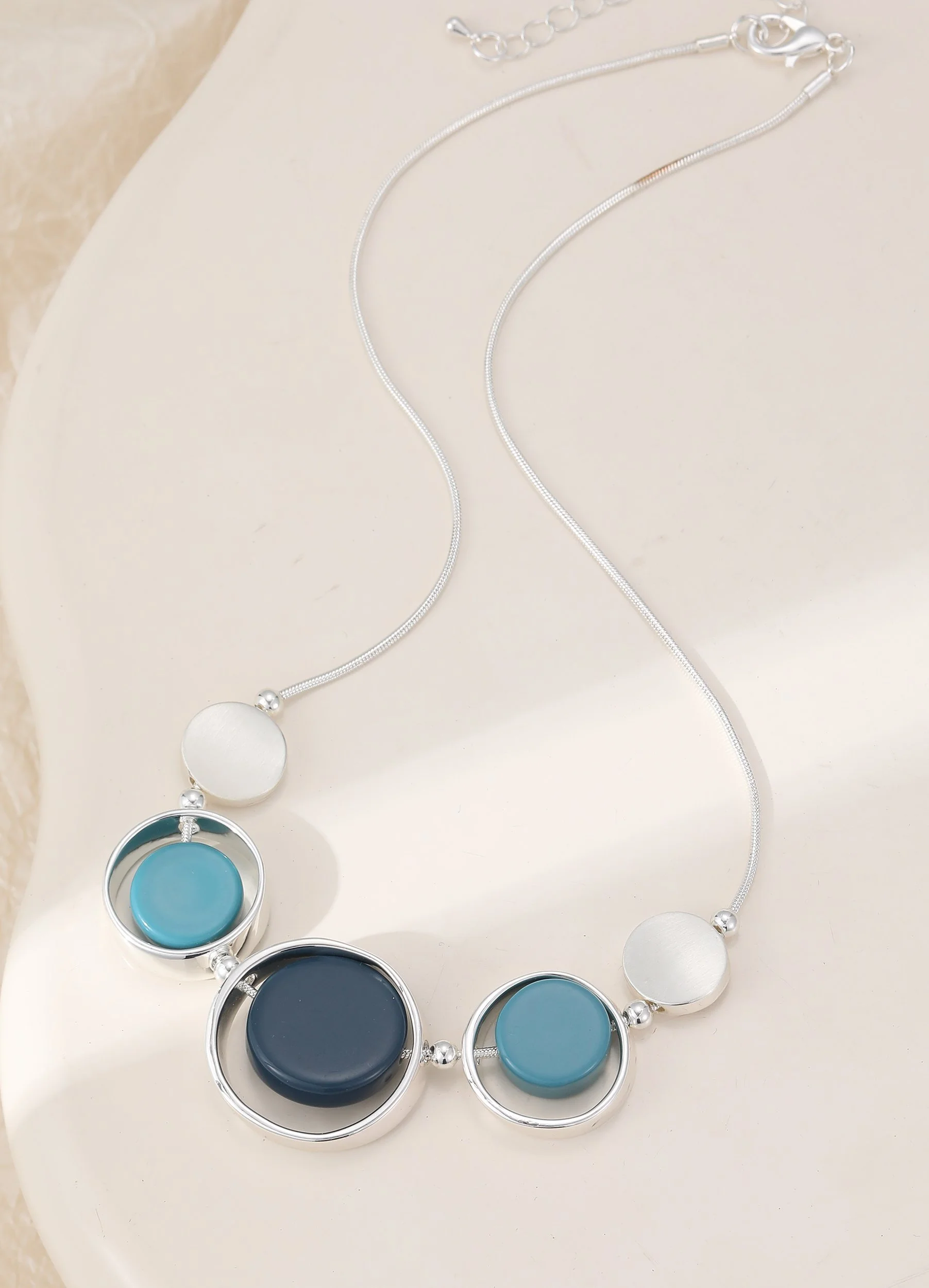 N603438S.  Blue circles necklace