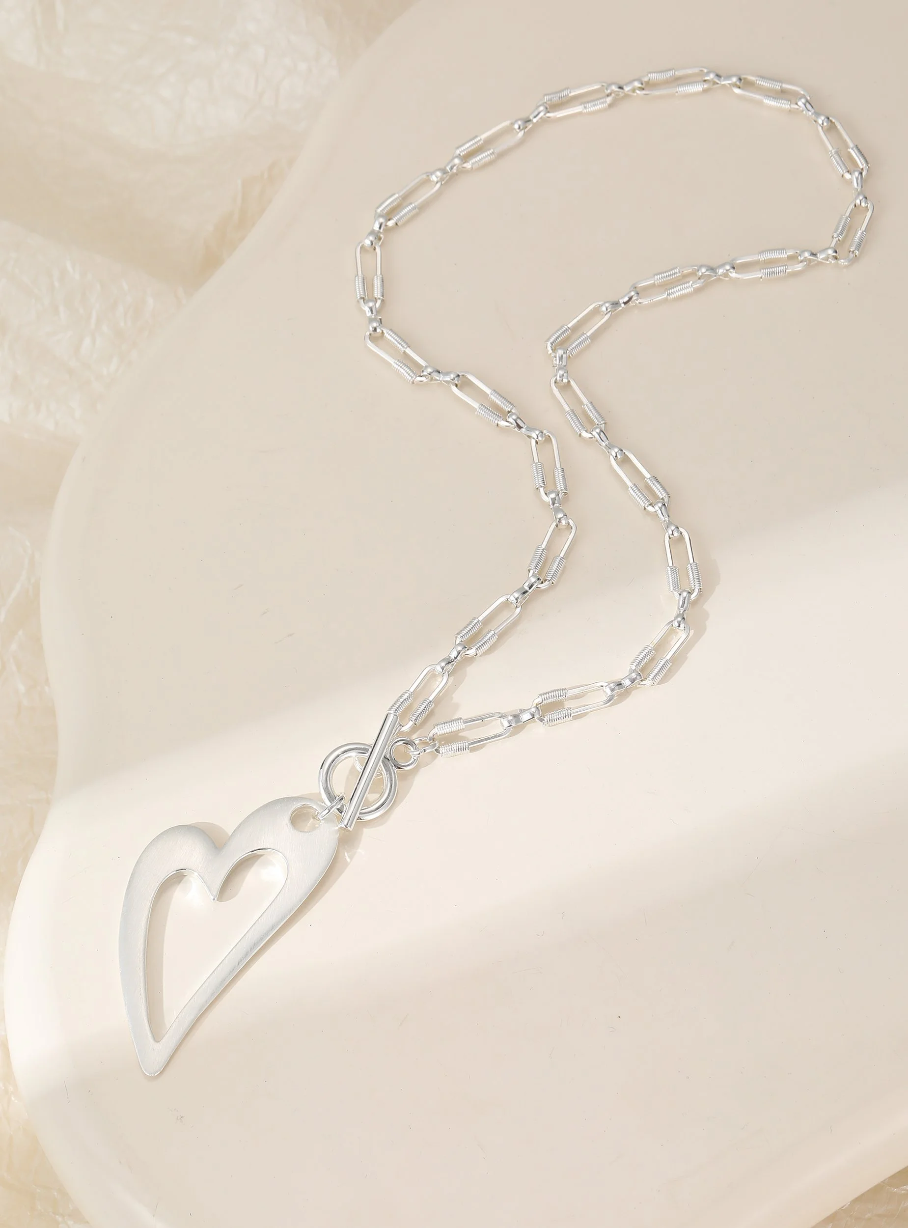 N603490S.  Abstract heart necklace