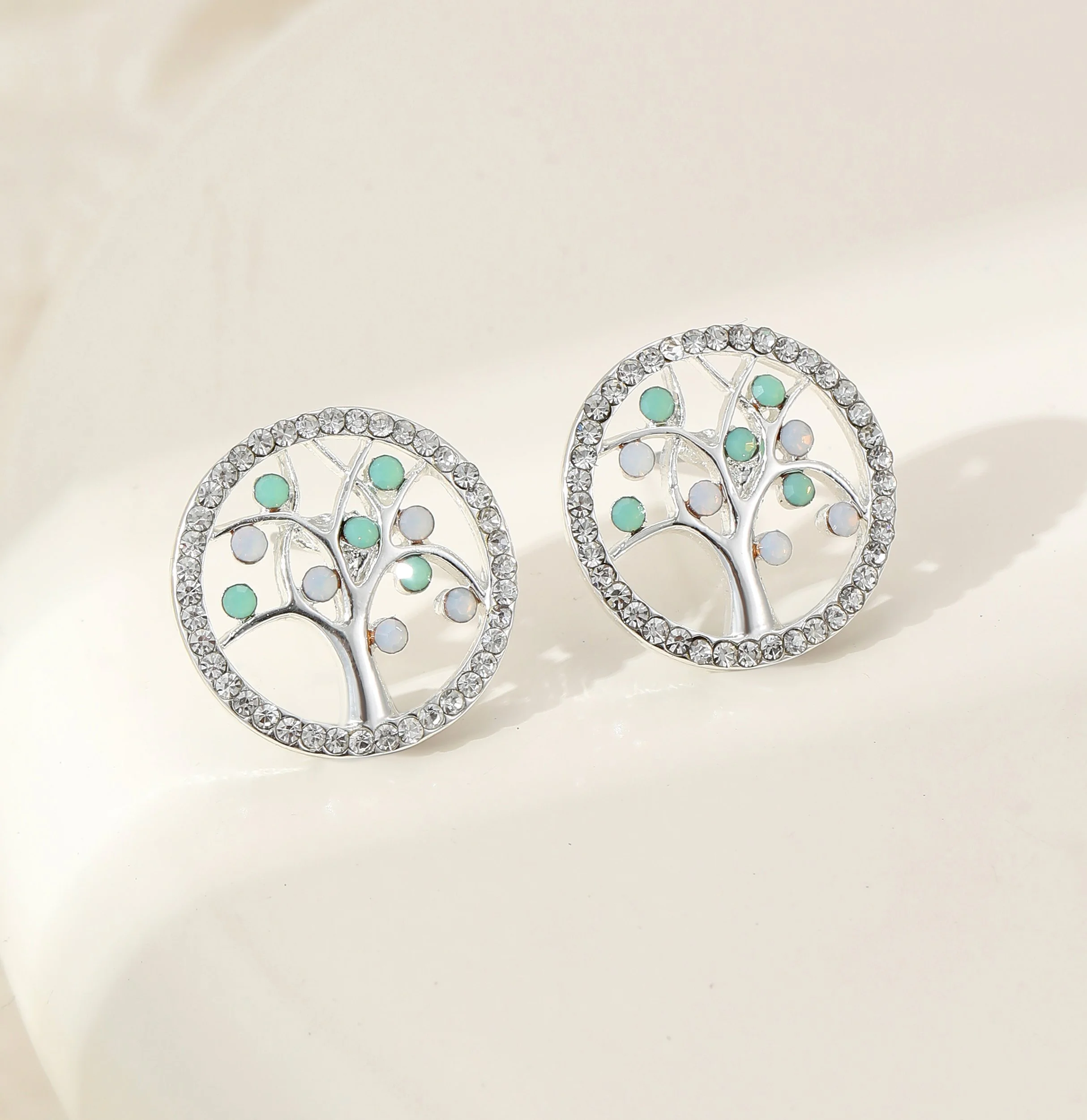 E102446S.  Crystals tree of life stud earrings