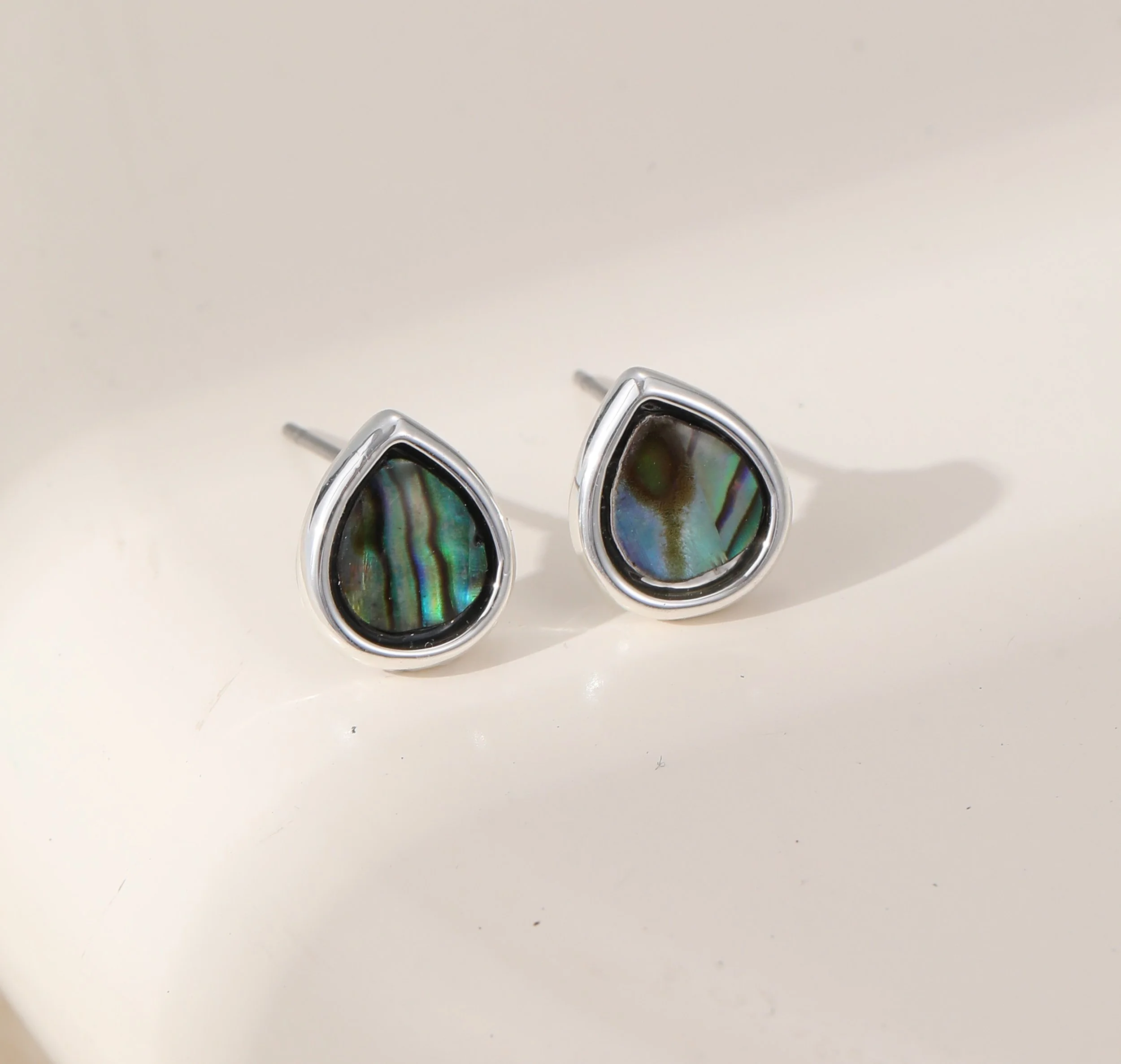 E102387S.  Paua shell stud earrings