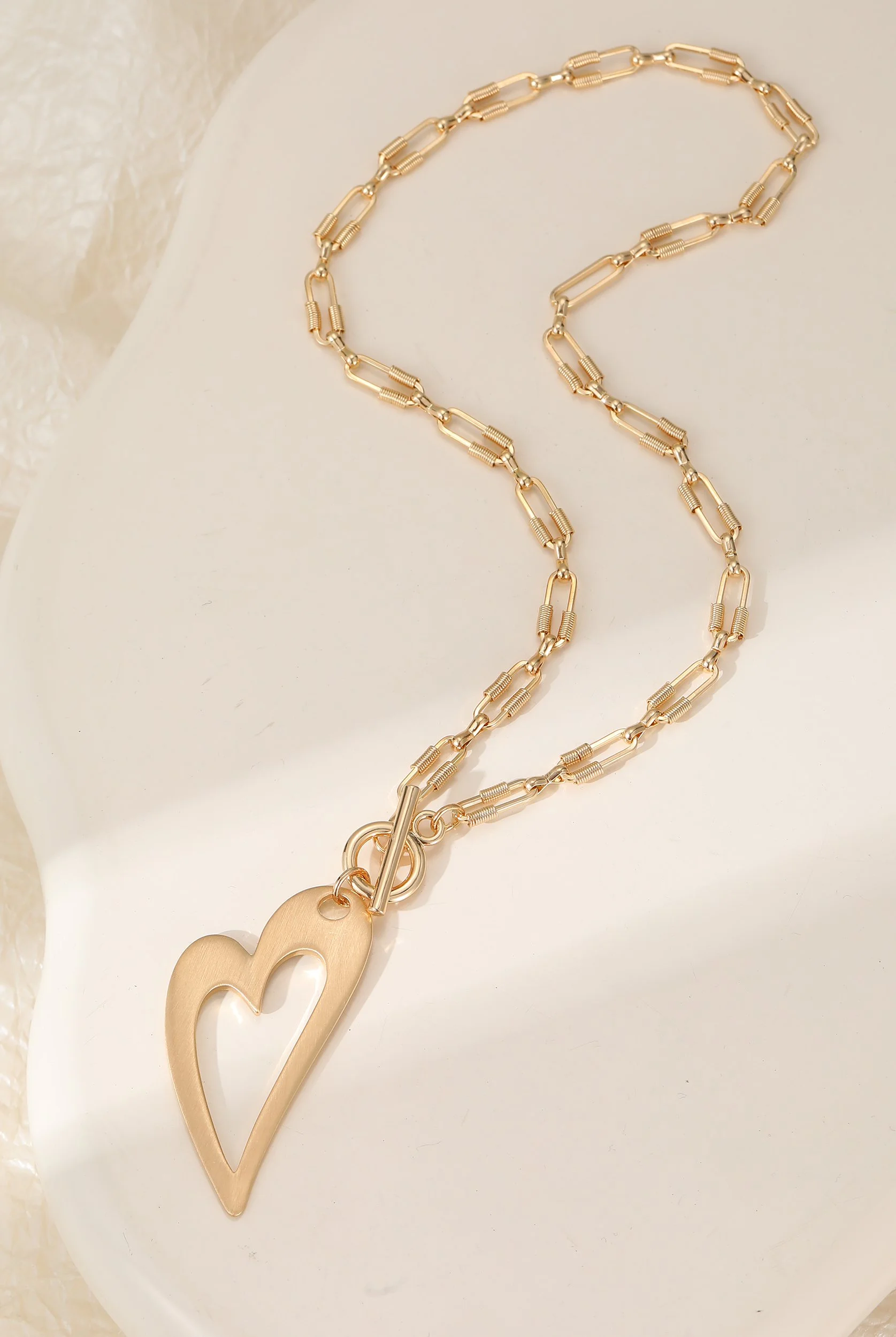 N603490G.  Gold abstract necklace