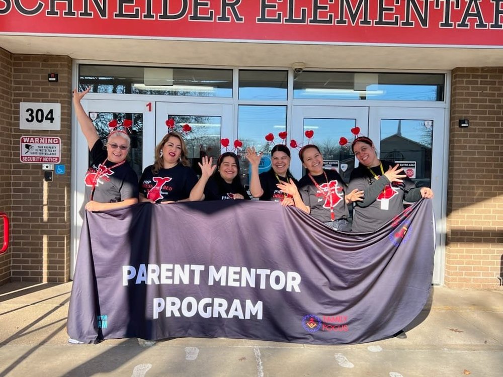 Family Focus Aurora Parent Mentors dress up for American Heart Month.