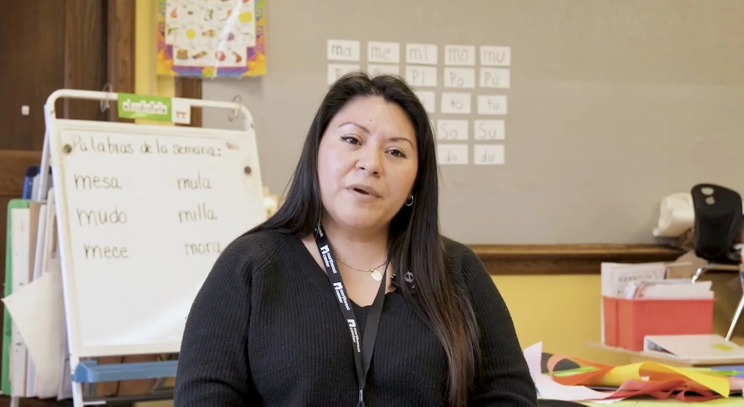 Smiling Latina in a classroom