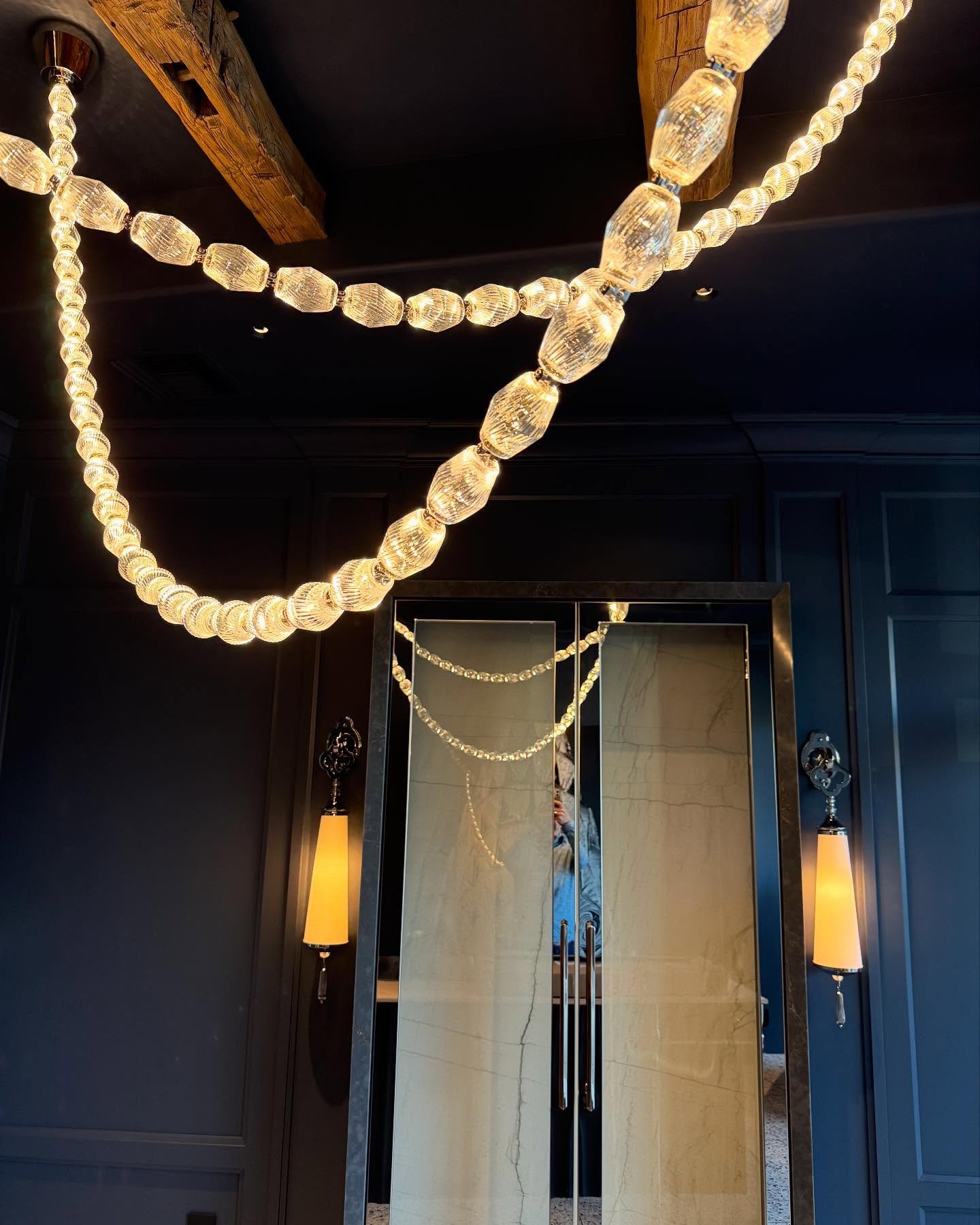 Our showroom renovation continues to come together with our @visualcomfort  Collier chandeliers and our new sconces from @globalviews being installed on the sides of our built in china cabinet by @artcraftkitchens Up next is the countertop on our @ch