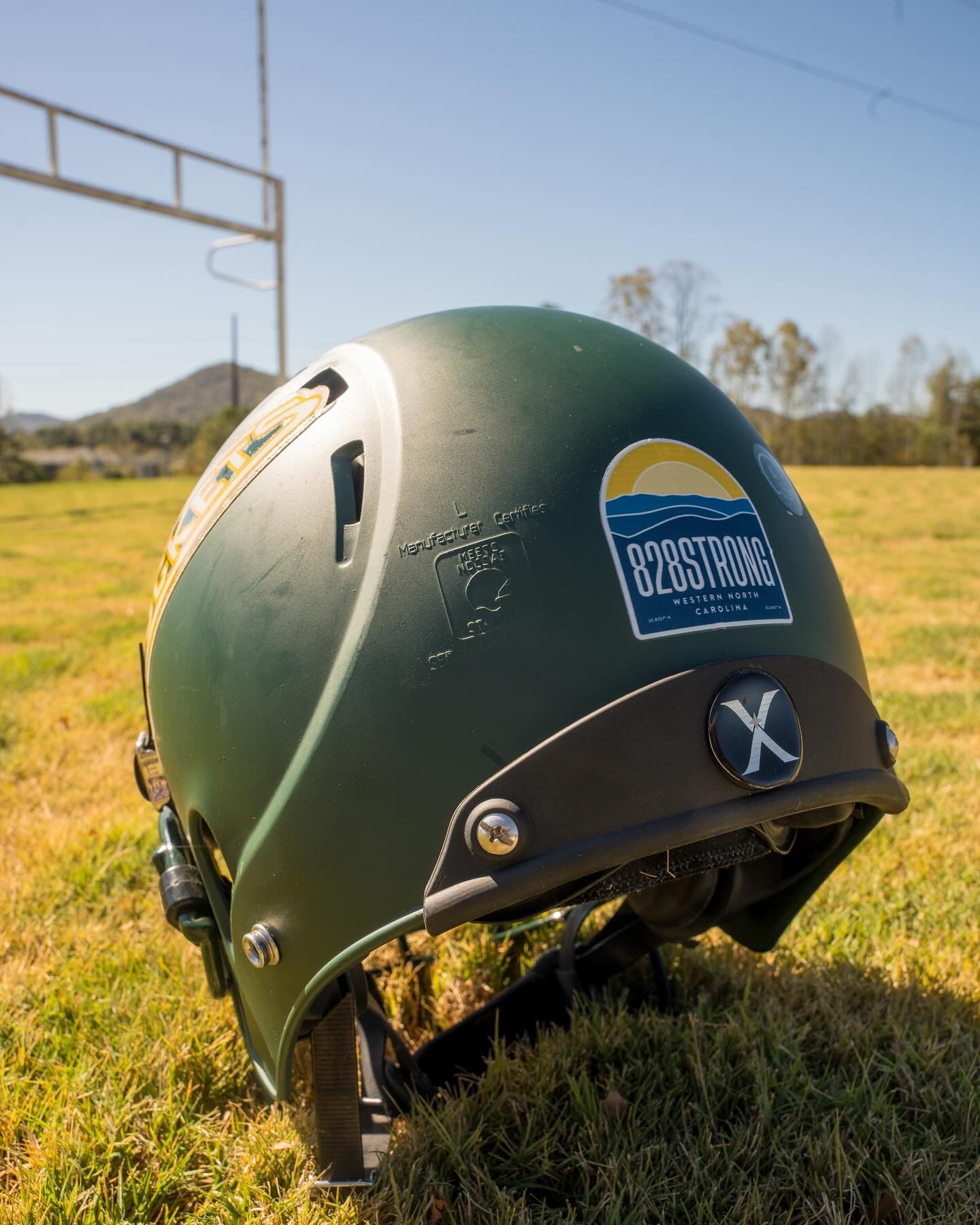 Teams across WNC will be starting to sport new decals on their helmets this week. We are #828Strong 💪