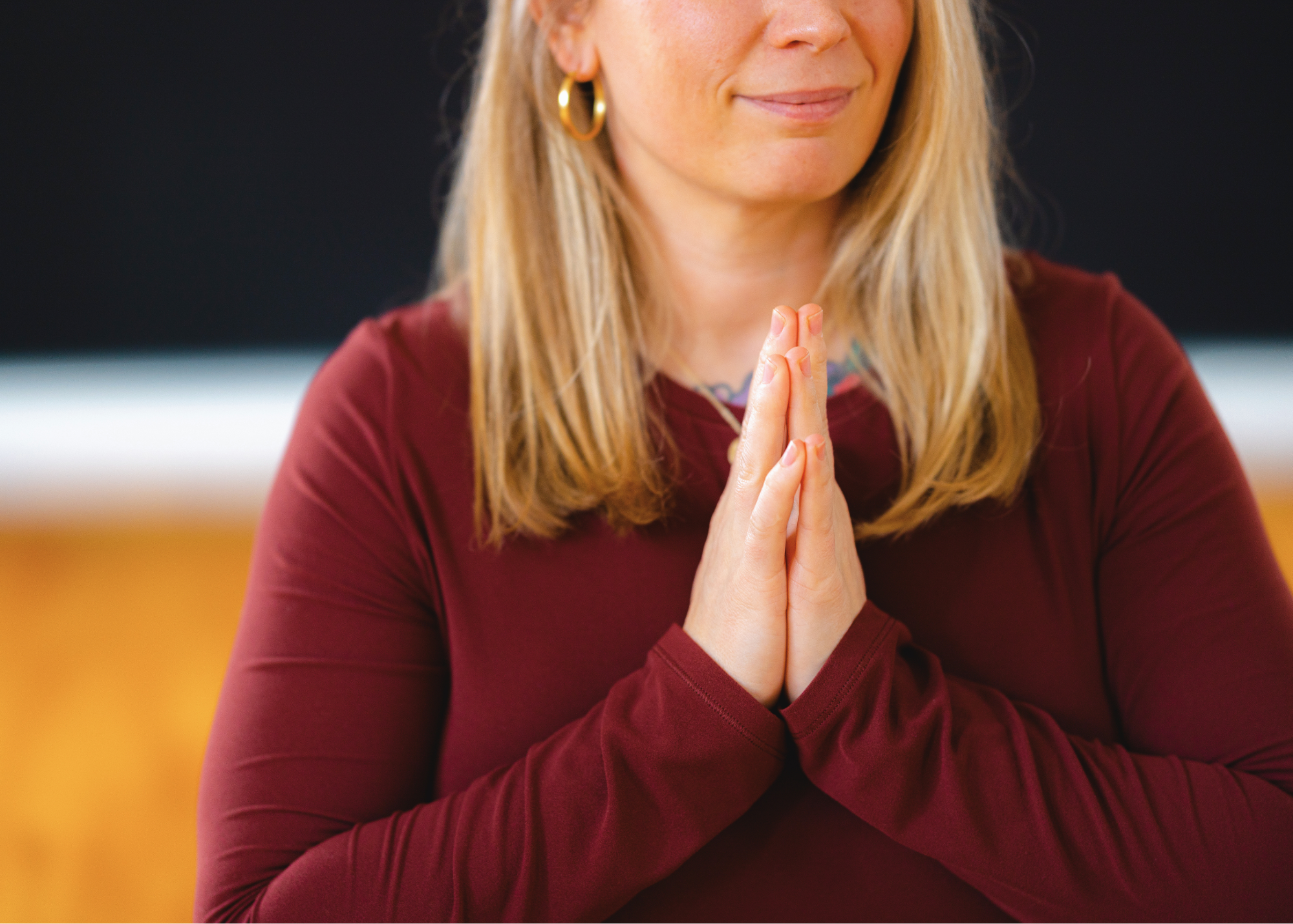 Lauren Reek yoga teacher Long Island hands in prayer pose Massapequa studio