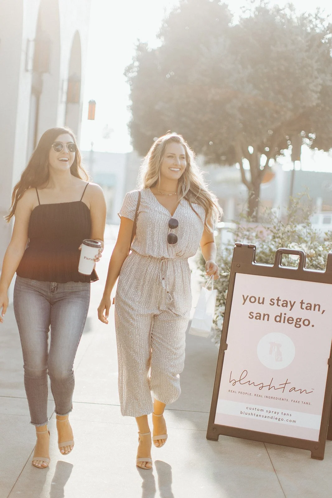 La Jolla Village tanning. Girls walking to 7863 Girard ave. La Jolla