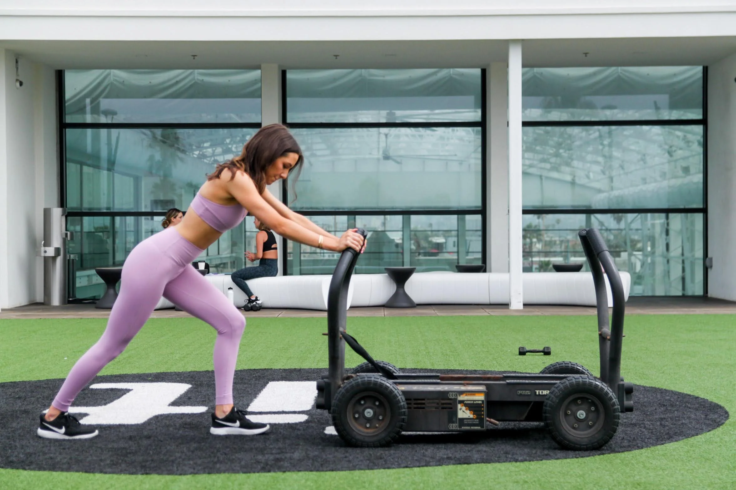 athletic woman in Point Loma with a spray tan