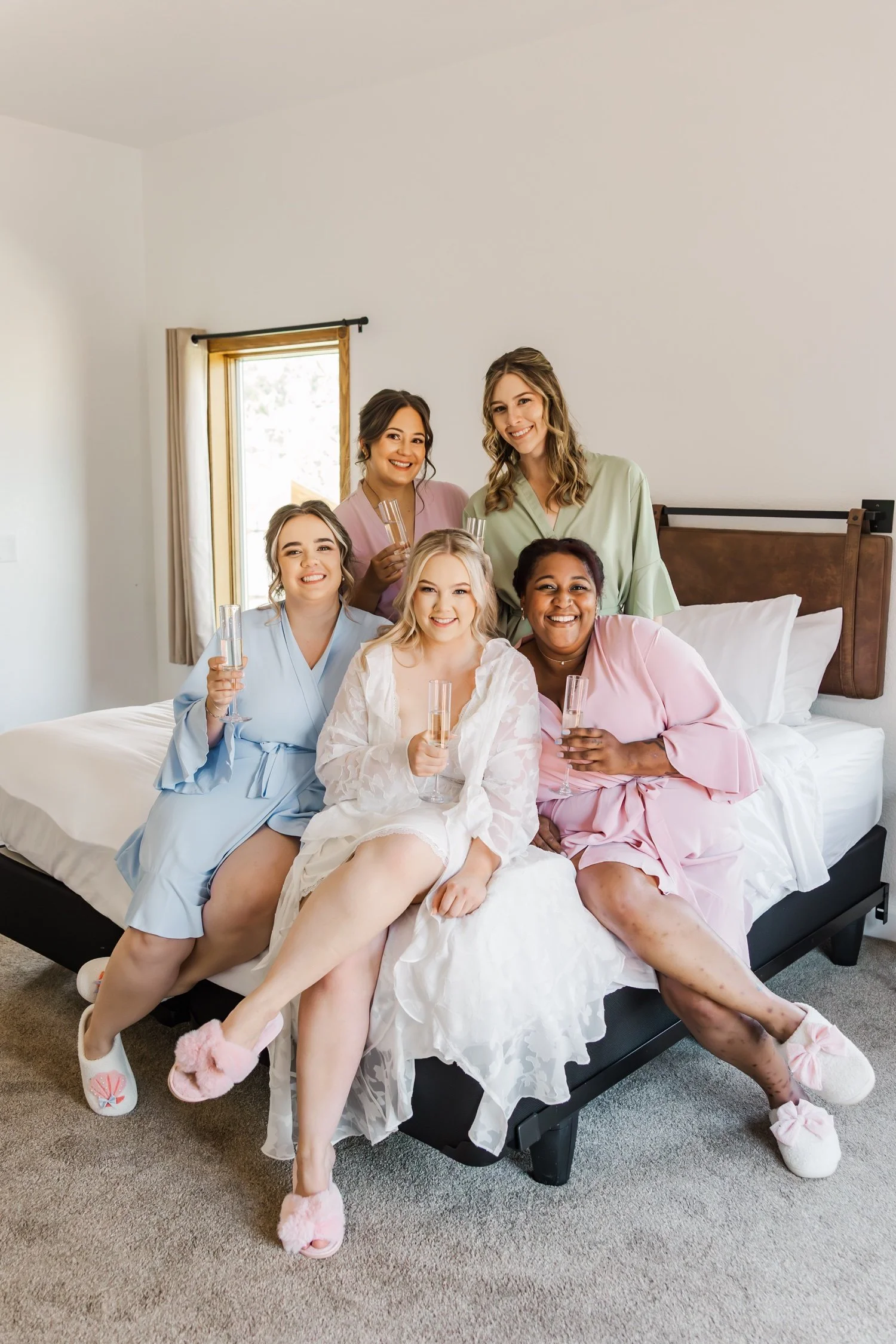 03_pastel-wedding-colors-bridesmaids-getting-ready-attire.jpg
