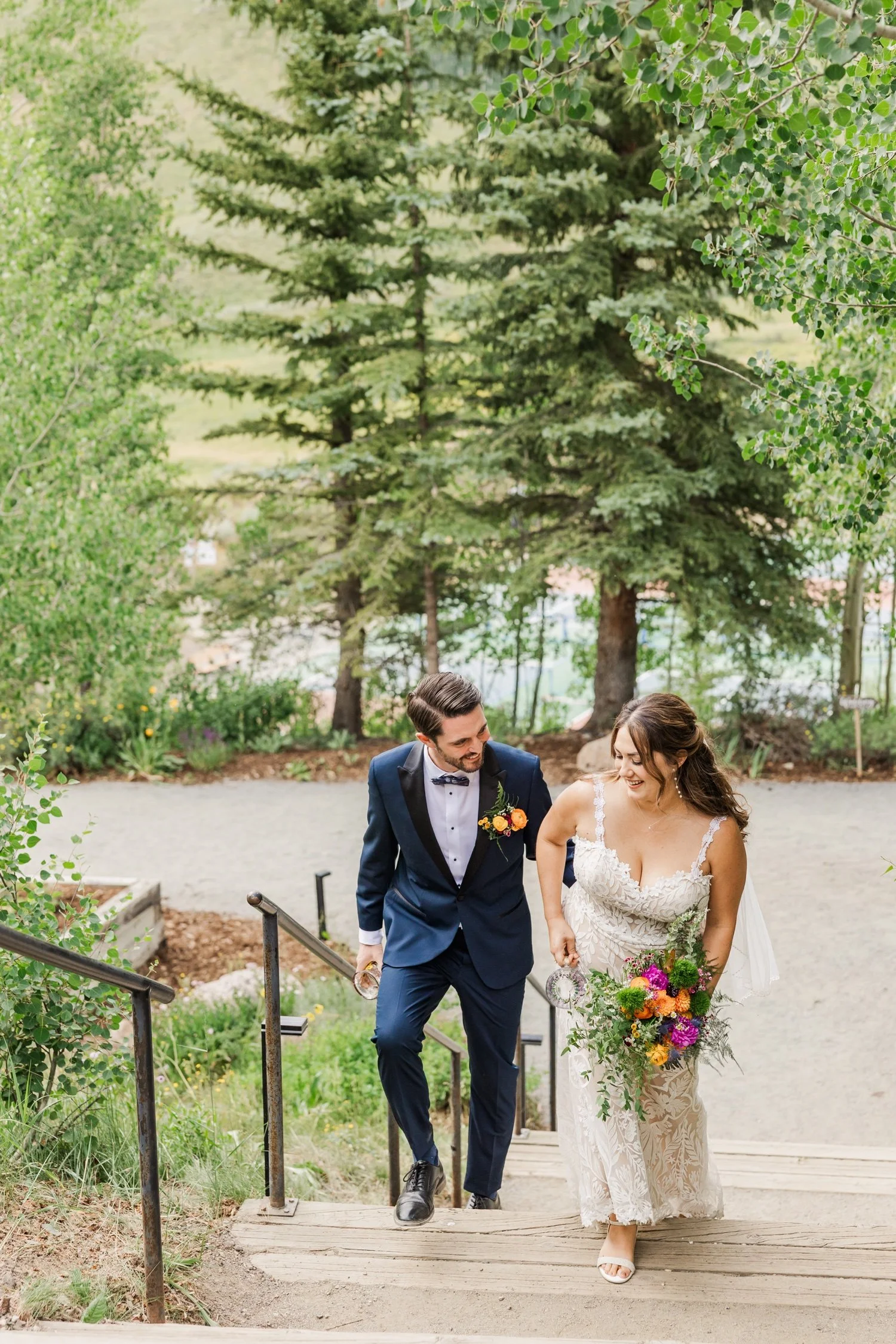 21_bride-and-groom-walk-at-mountain-wedding-garden-crested-butte.jpg