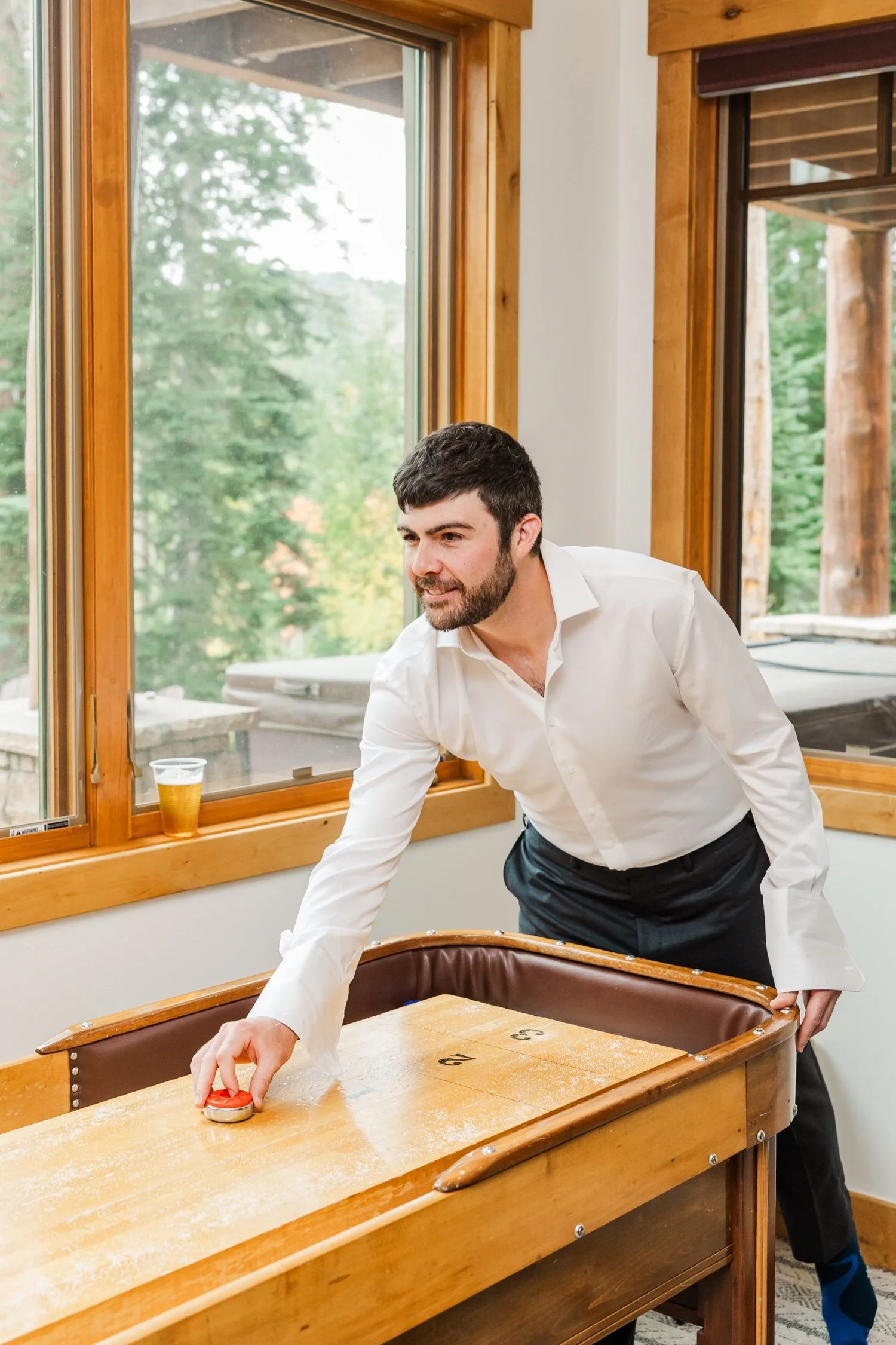 06_grooms-getting-ready-shuffle-board-colorado.jpg