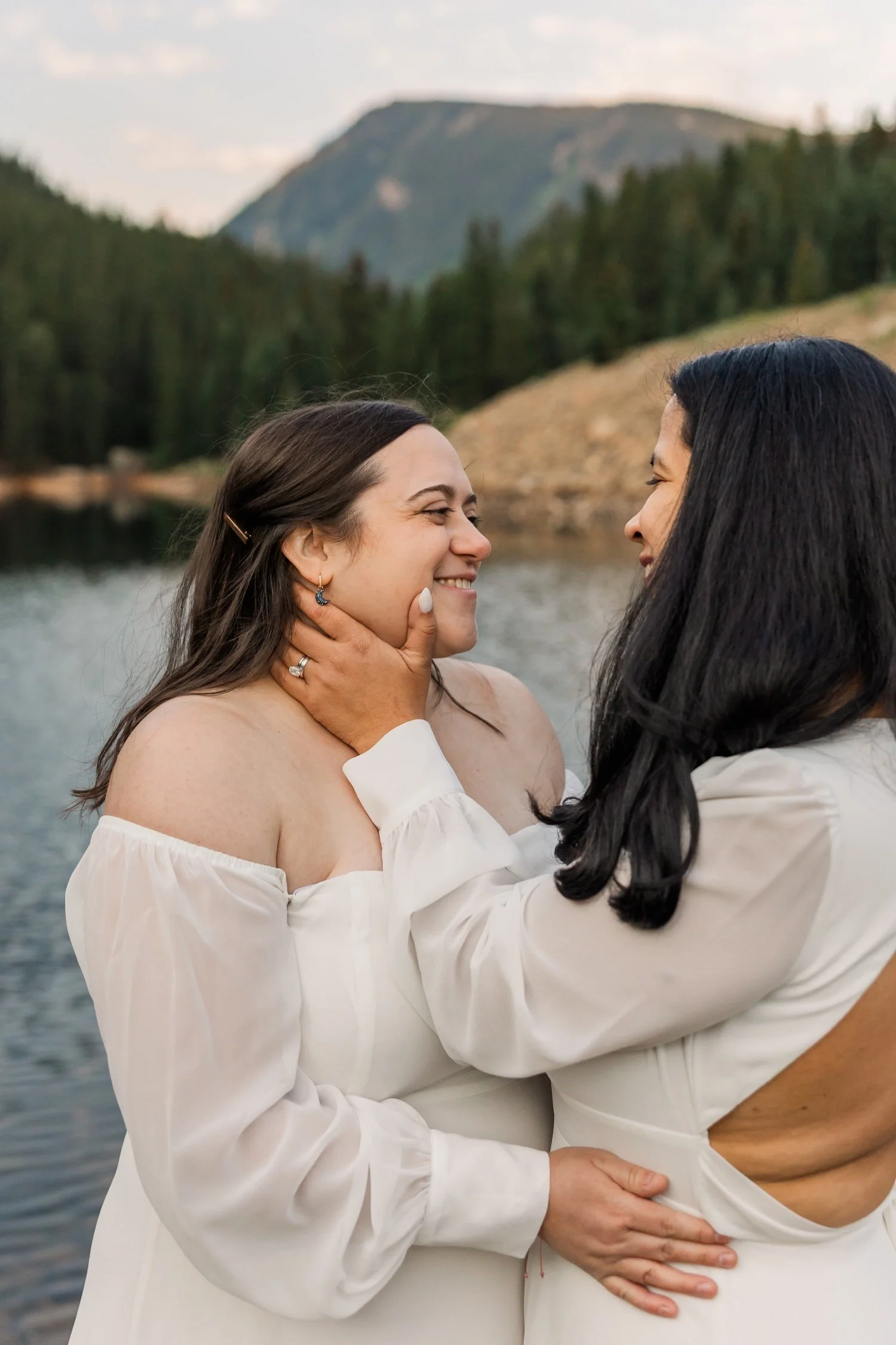 26_bride-smiles-at-bride-during-colorado-adventure-elopement.jpg