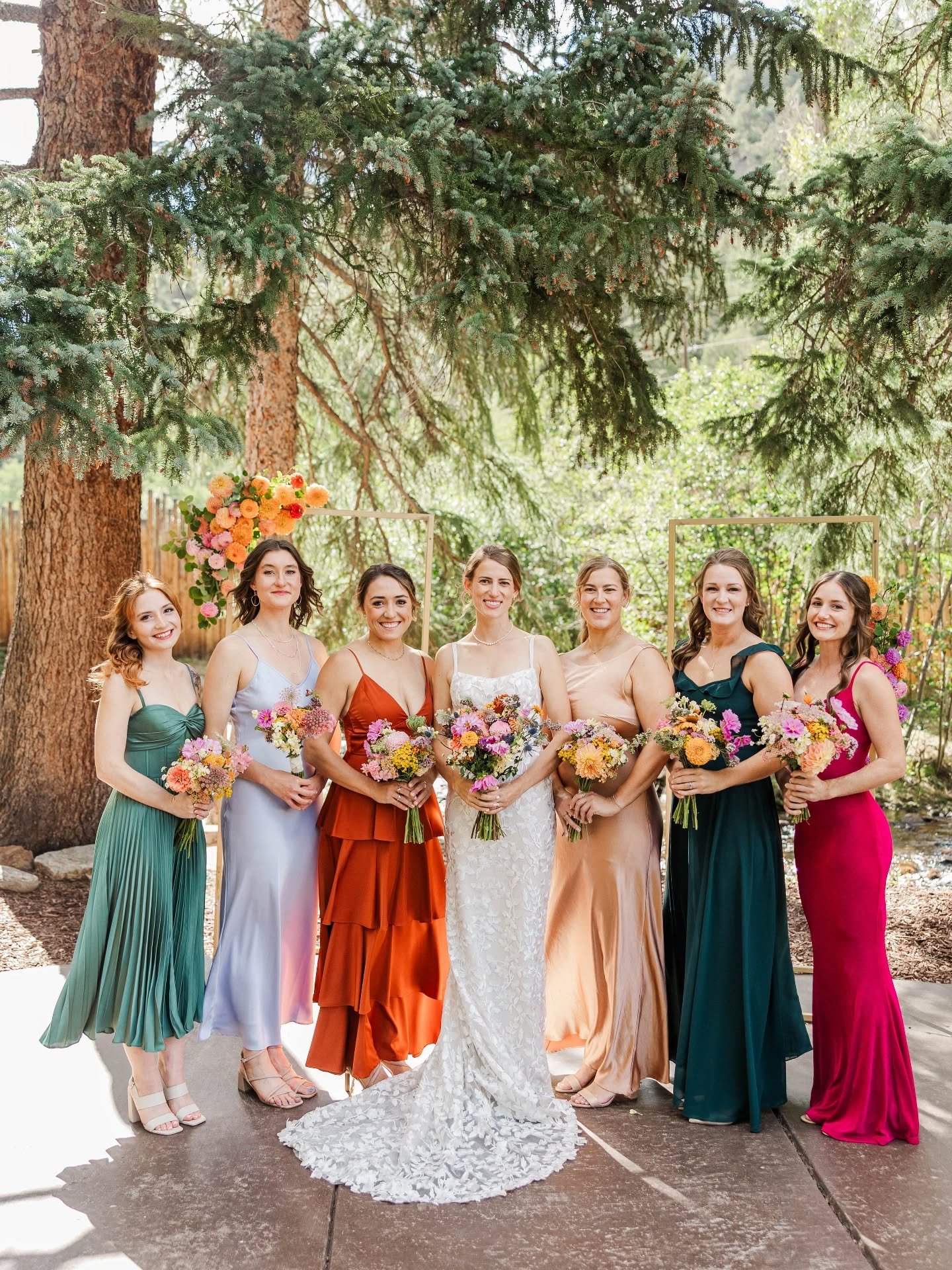 This color palette though???? 😍

Free yourself from the thought that everyone has to be matchy matchy for your wedding party. 

As I like to say, the wedding police aren't going to come arrest you for doing this!! The rules are meant to be broken an