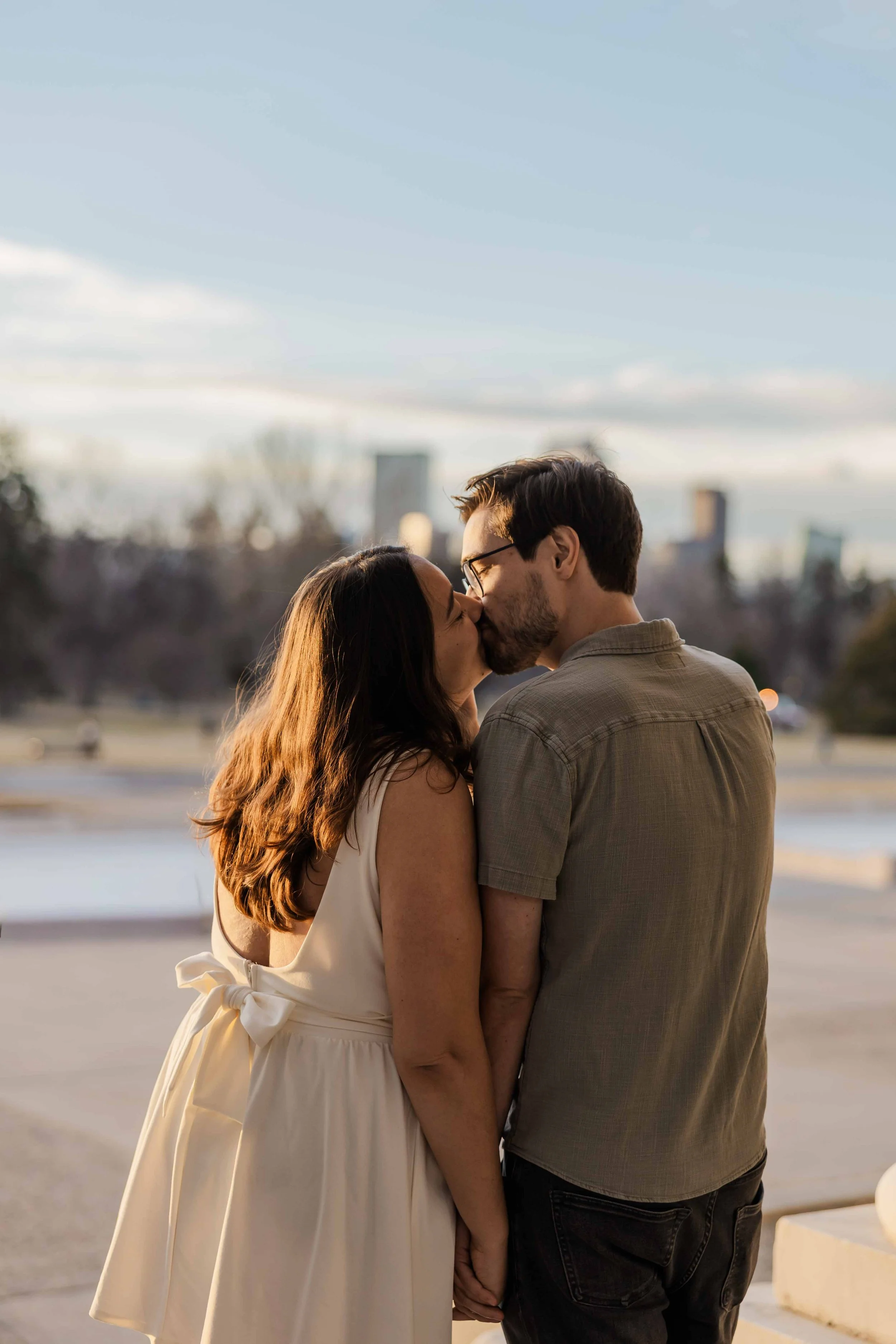 33_couple-kisses-at-cheesman-park-after-getting-engaged.jpg
