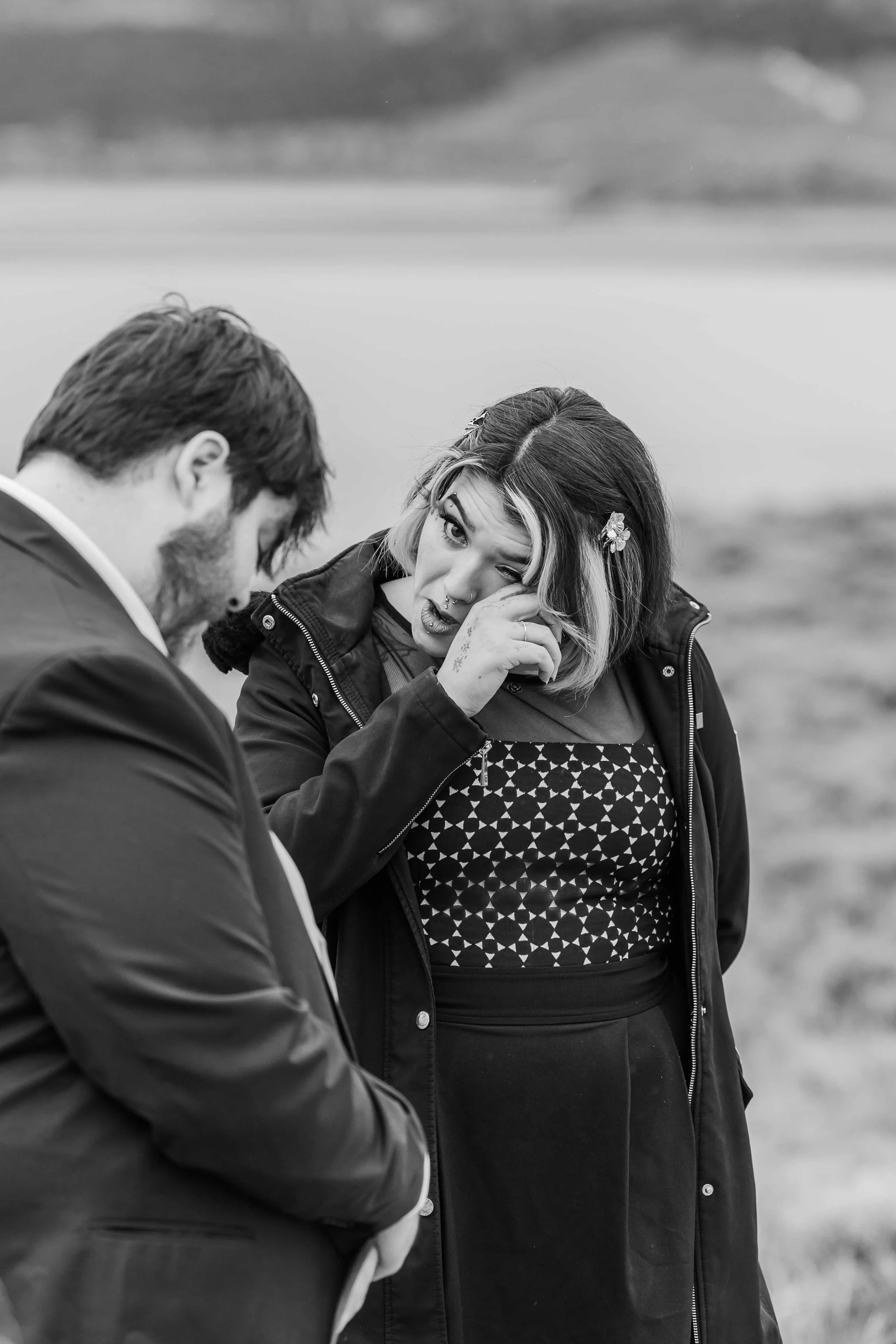 8-friend-officiating-colorado-elopement-ceremony-tears-up-during-vows.jpg