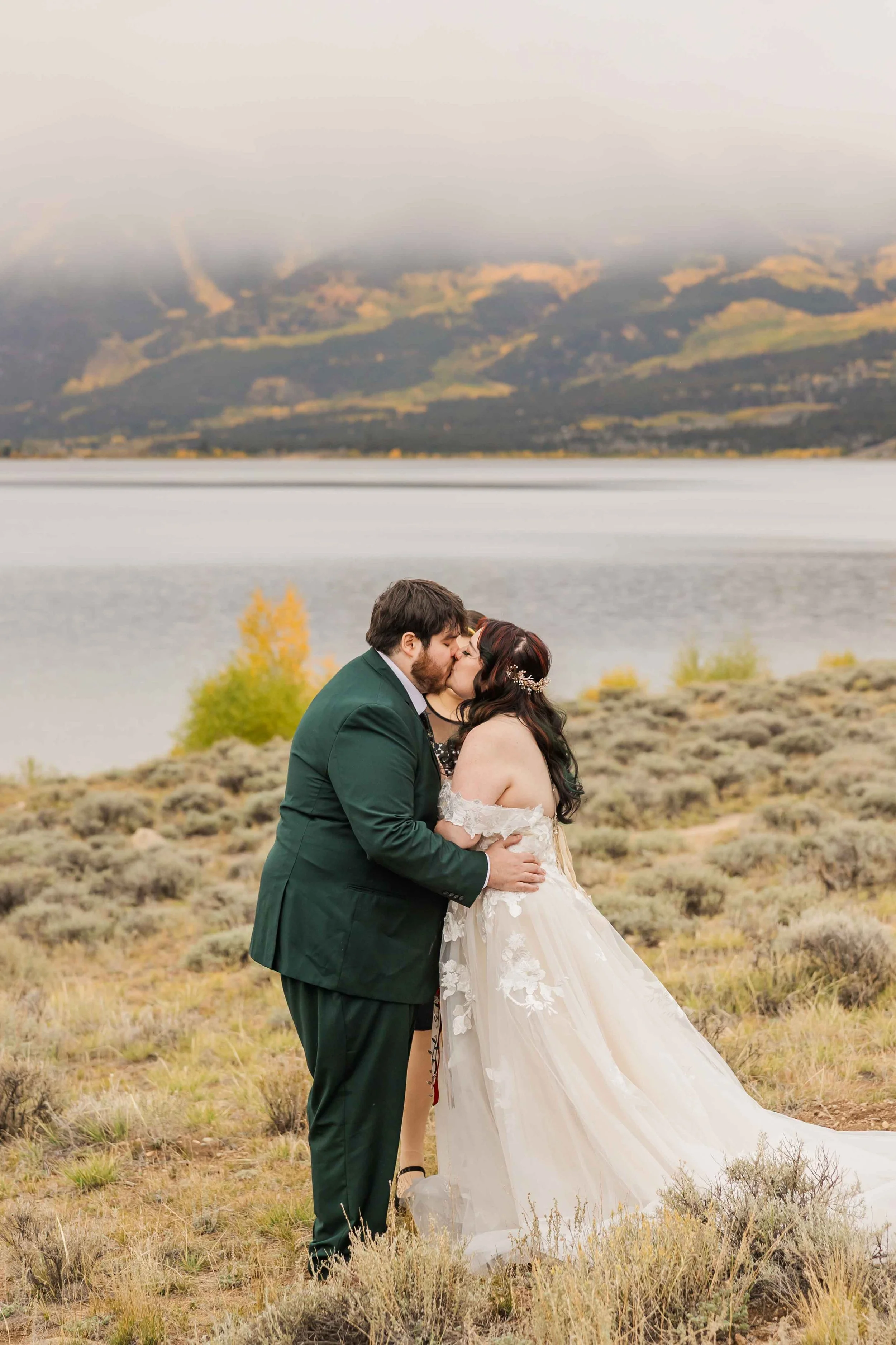 12-bride-and-groom-kiss-following-intimate-ceremony-in-twin-lakes-colorado.jpg