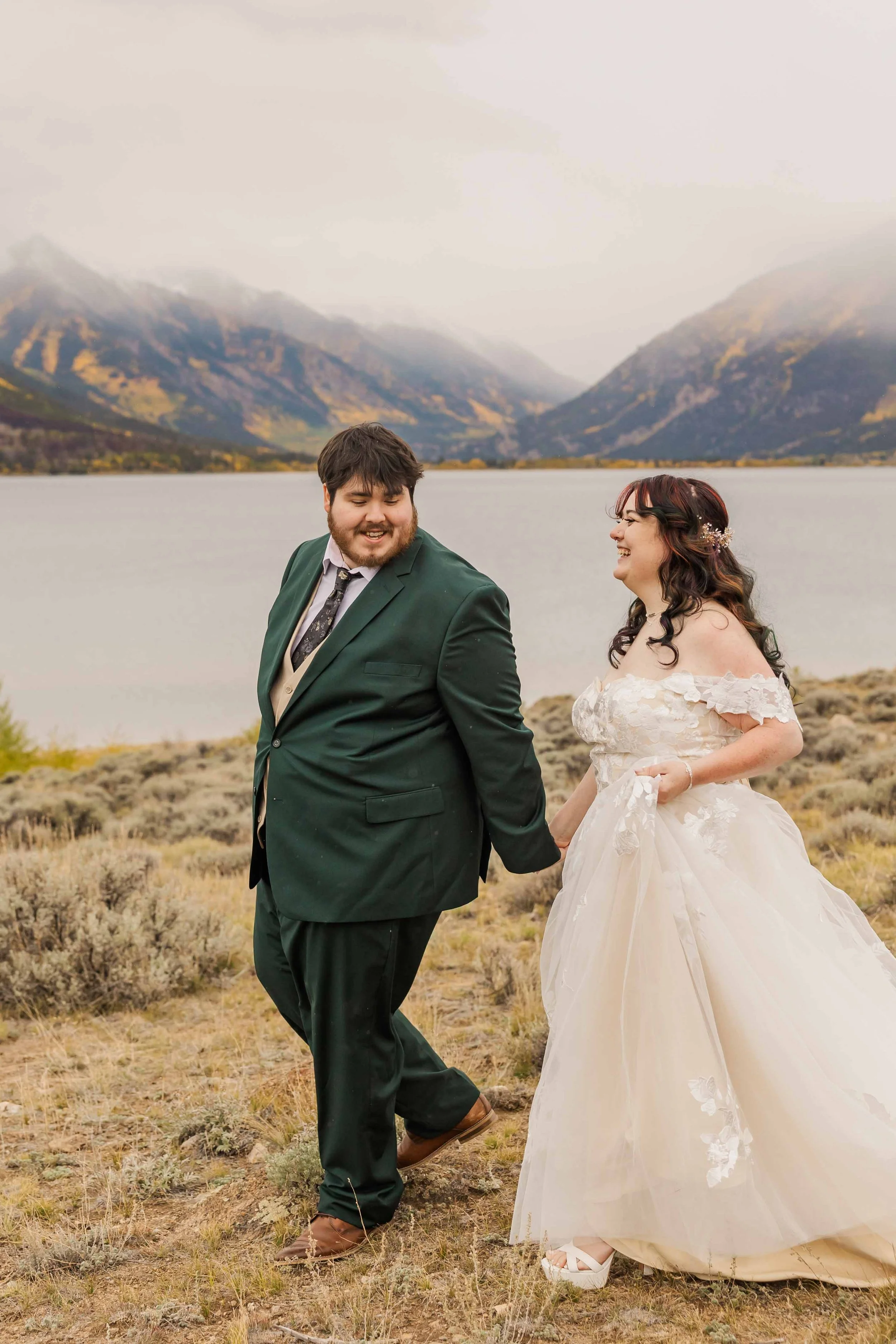 20-bride-and-groom-hike-following-fall-elopement-ceremony-in-colorado.jpg