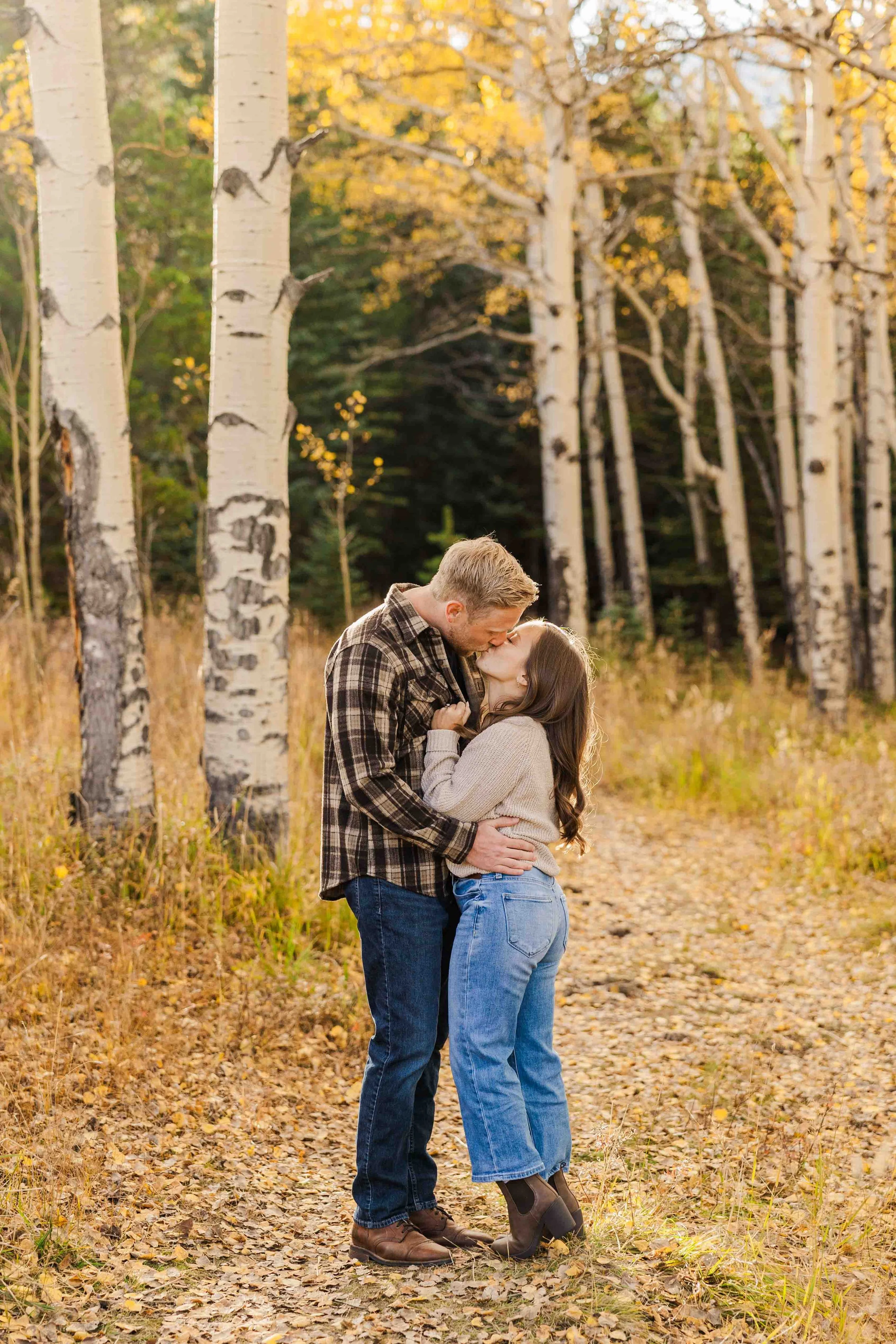 3-engagement-photos-with-yellow-aspens-colorado.jpg